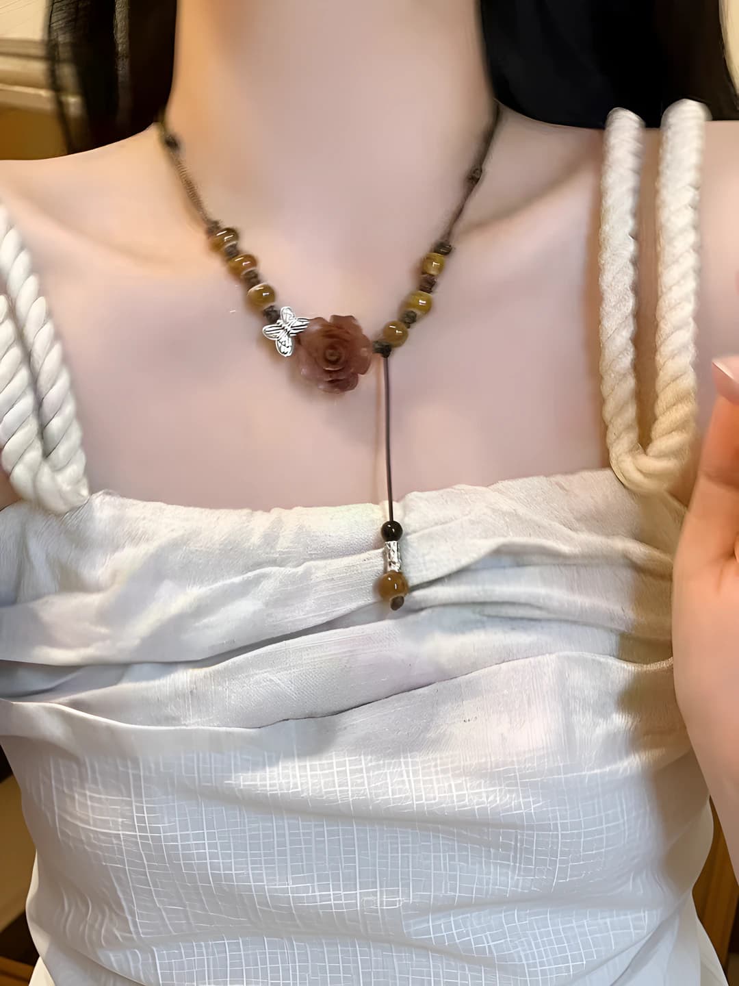 Women's beaded necklace with camellia design element, hand-woven, ceramic and artificial crystal