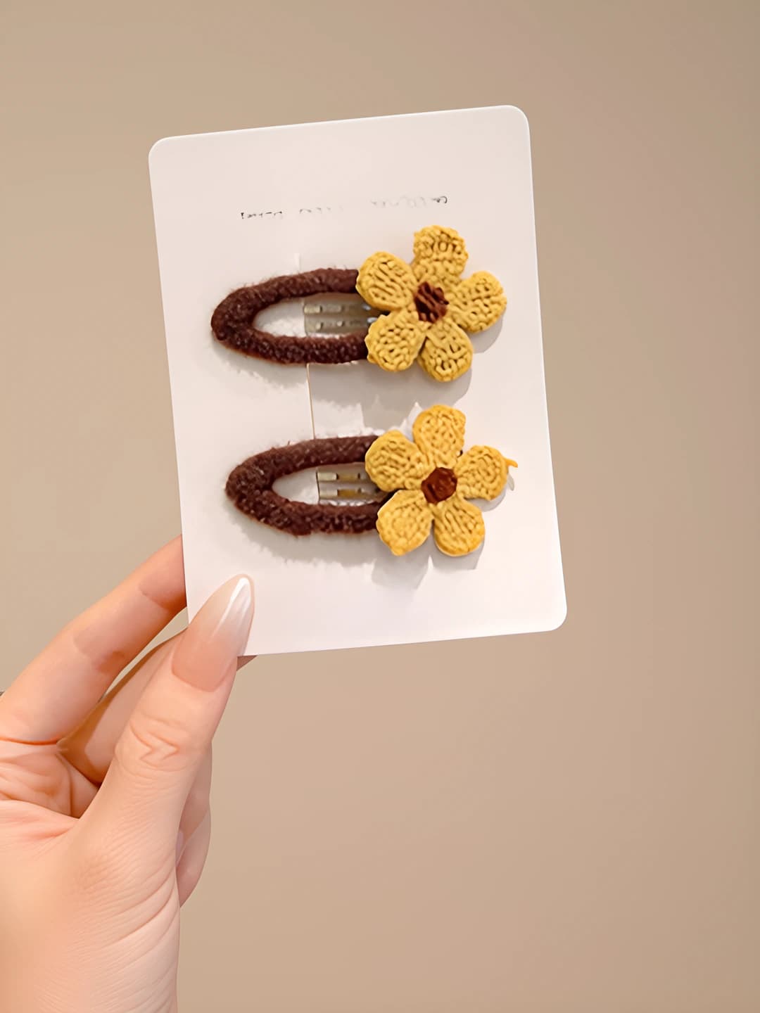 Yellow knitted floral clip, ~6 cm