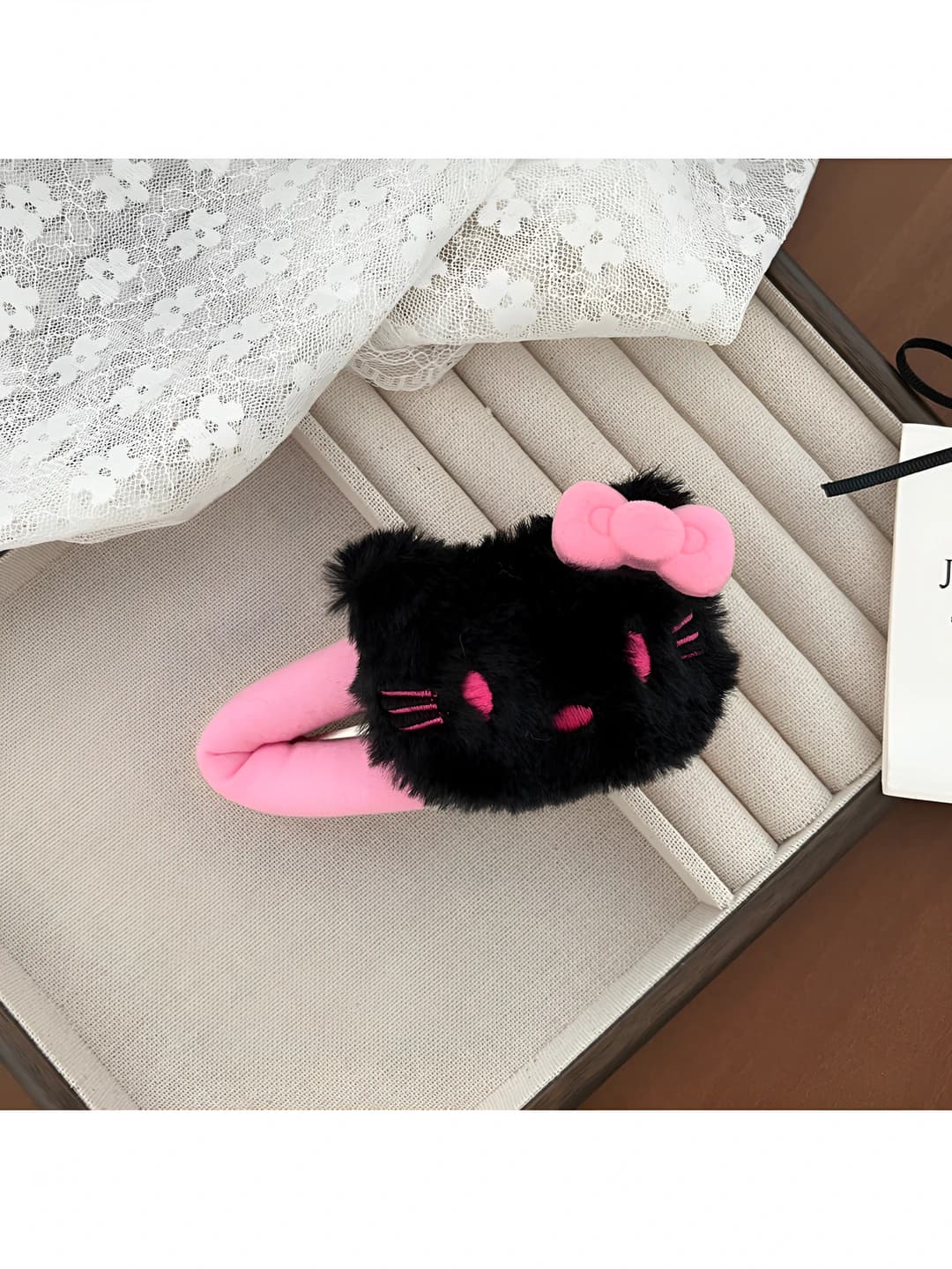 Black KT cat hair clip