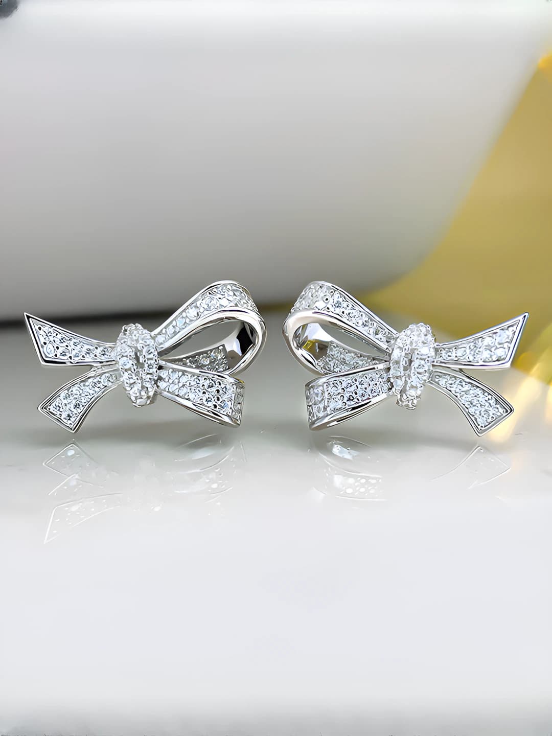 Women's bow-shaped stud earrings with tassels, geometric shape, European style, electroplated copper, for business style
