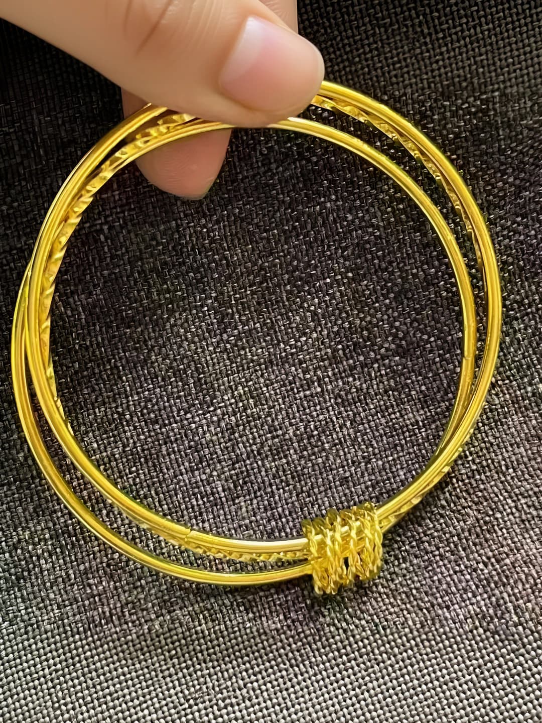 Three worlds gold ring bangle