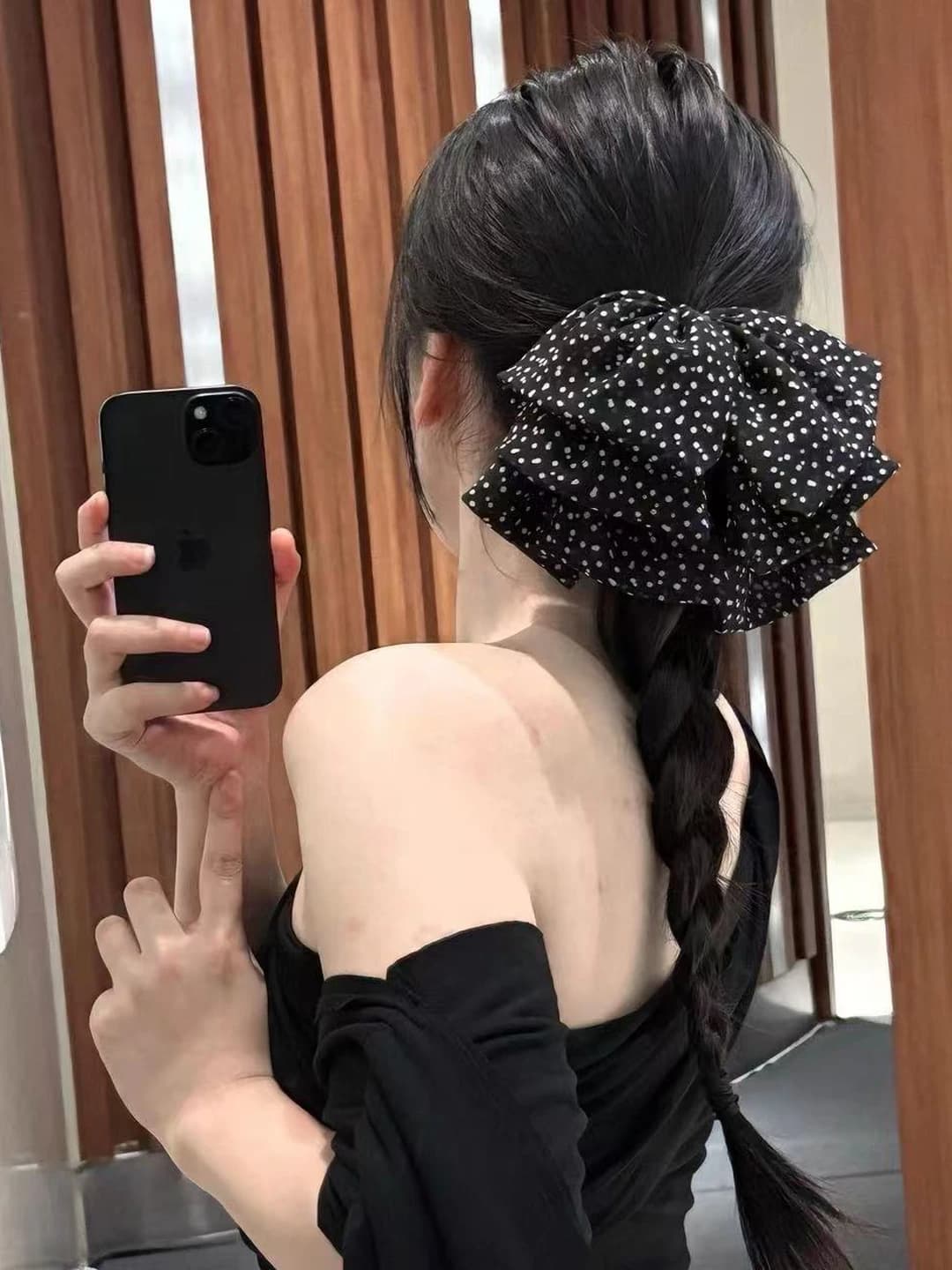 Black polka dot bow clip