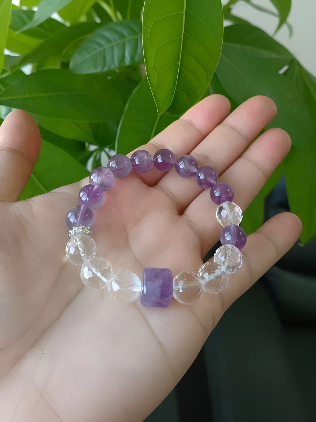 Faceted white purple crystal