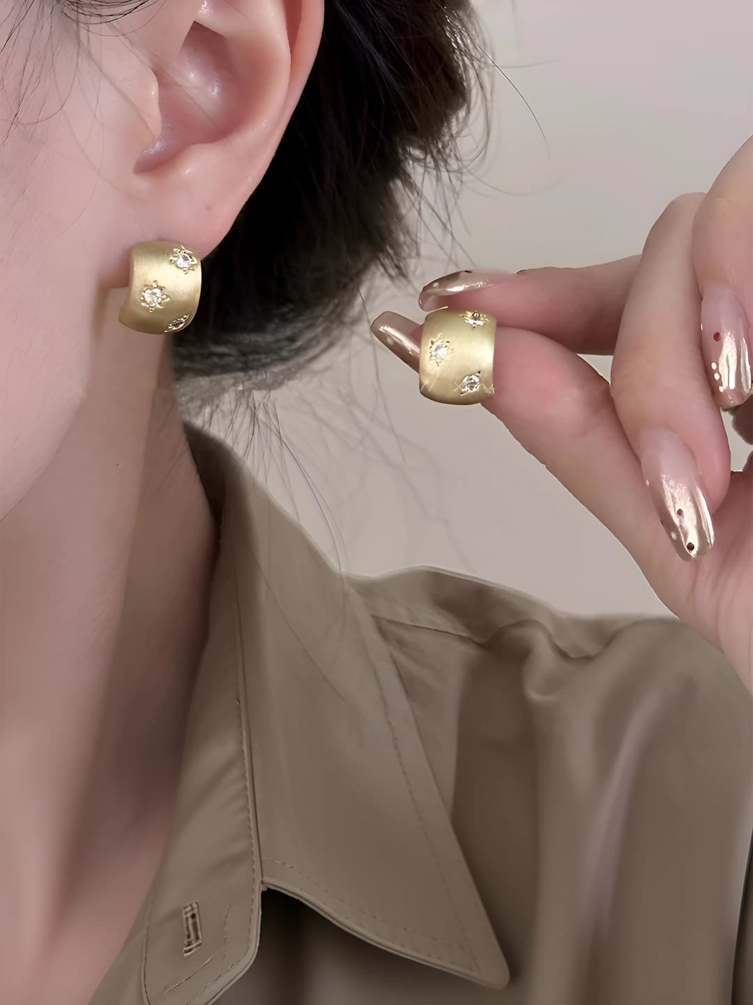 Gold starburst brushed studs