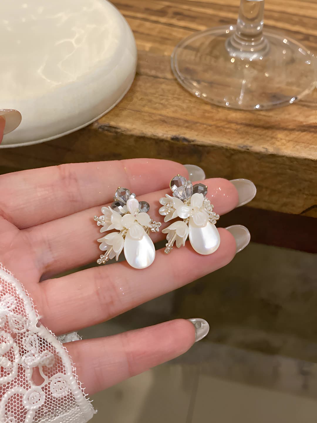 Women's retro style flower earrings with pearl inlays and glass material