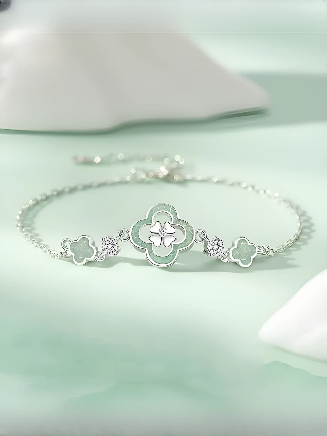 Women's retro style metal bracelet with flower and clover pendants