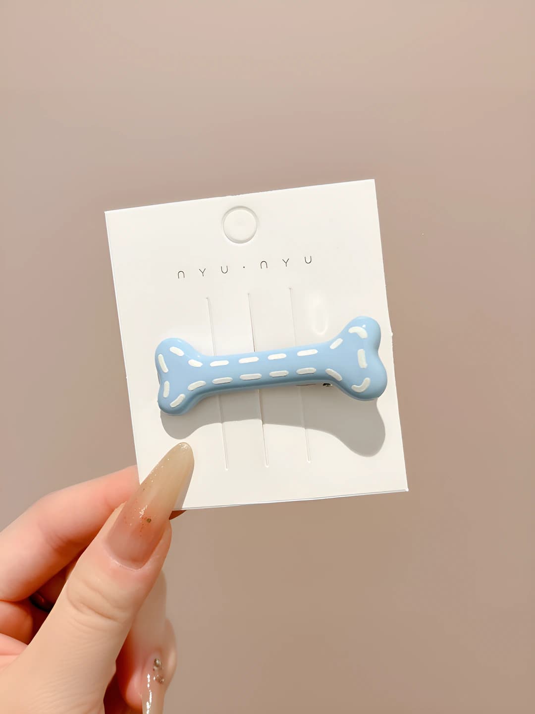 1# Light blue bone clip ~5.5 cm