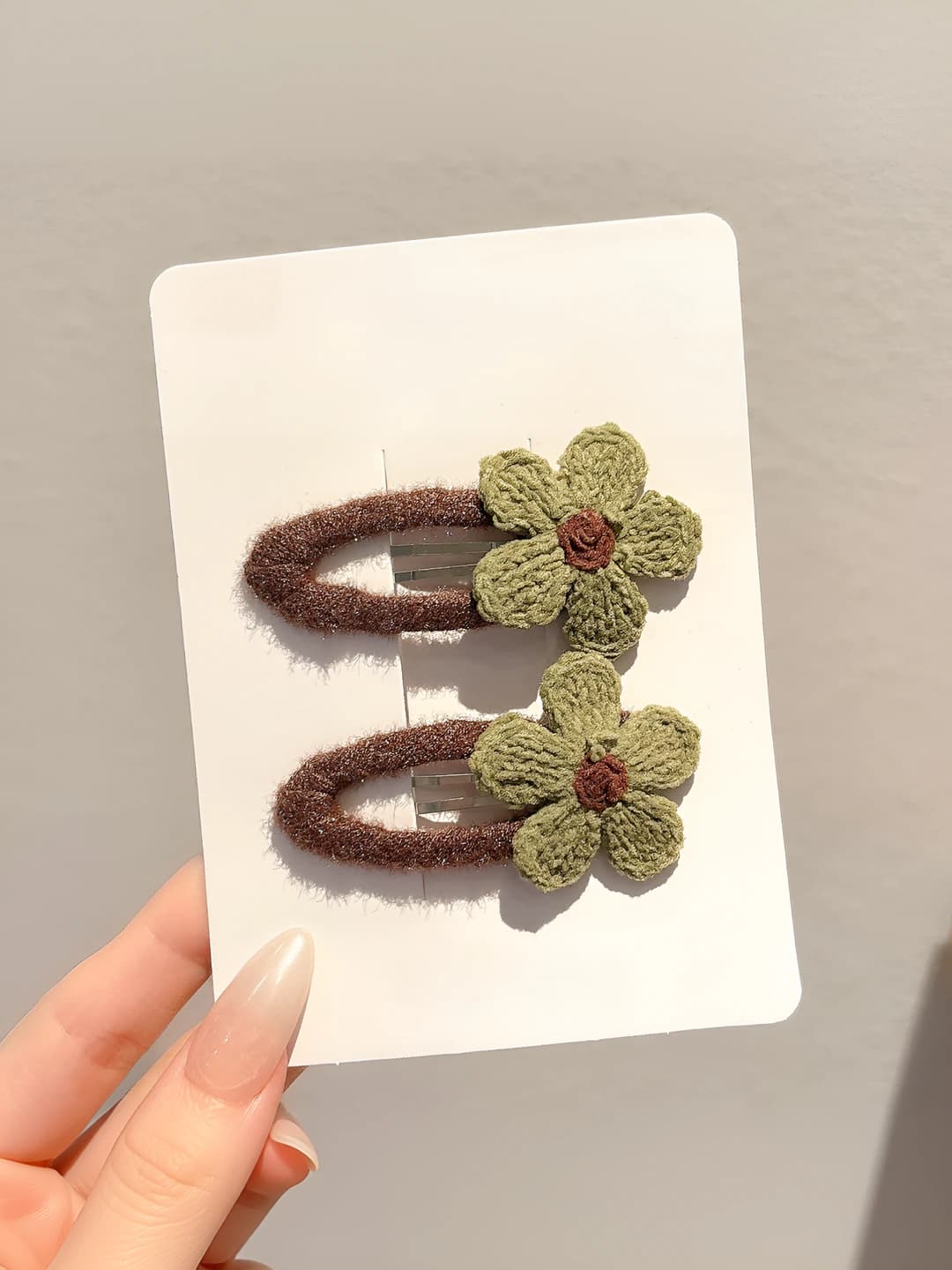 Knitted green flower, ~6 cm