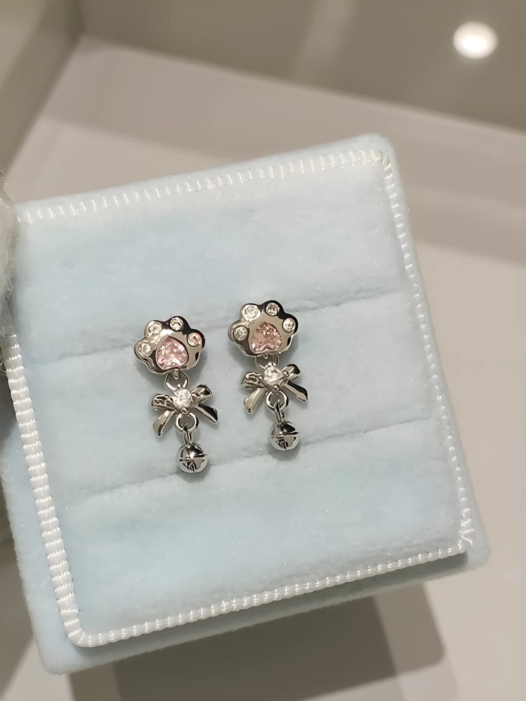Women's titanium steel earrings with pink bow, bell and cat paw
