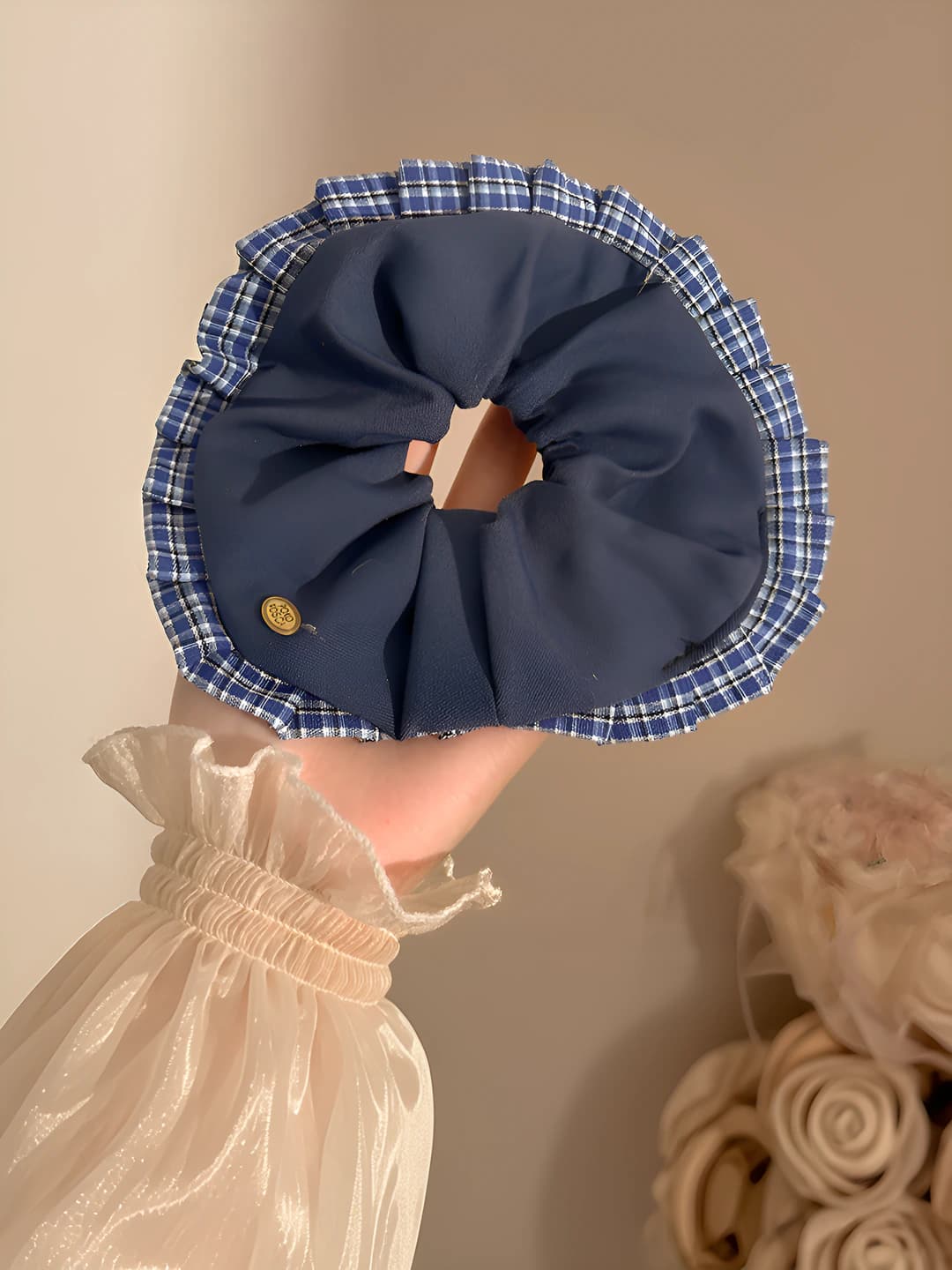 Blue scrunchie, plaid edge