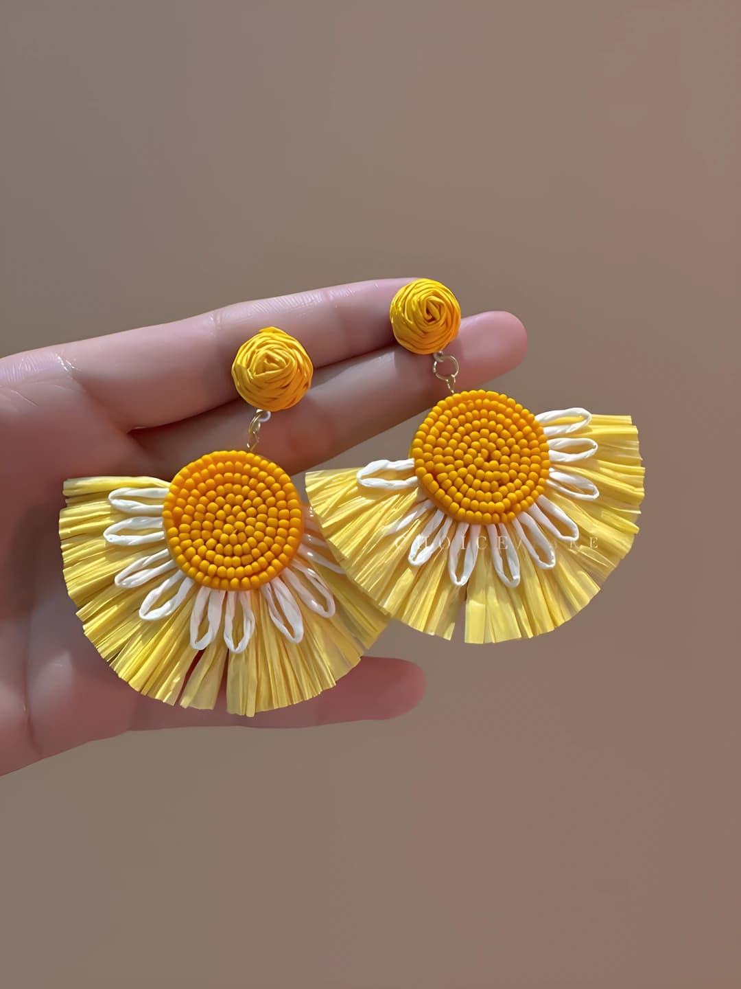 Yellow woven skirt stud earrings