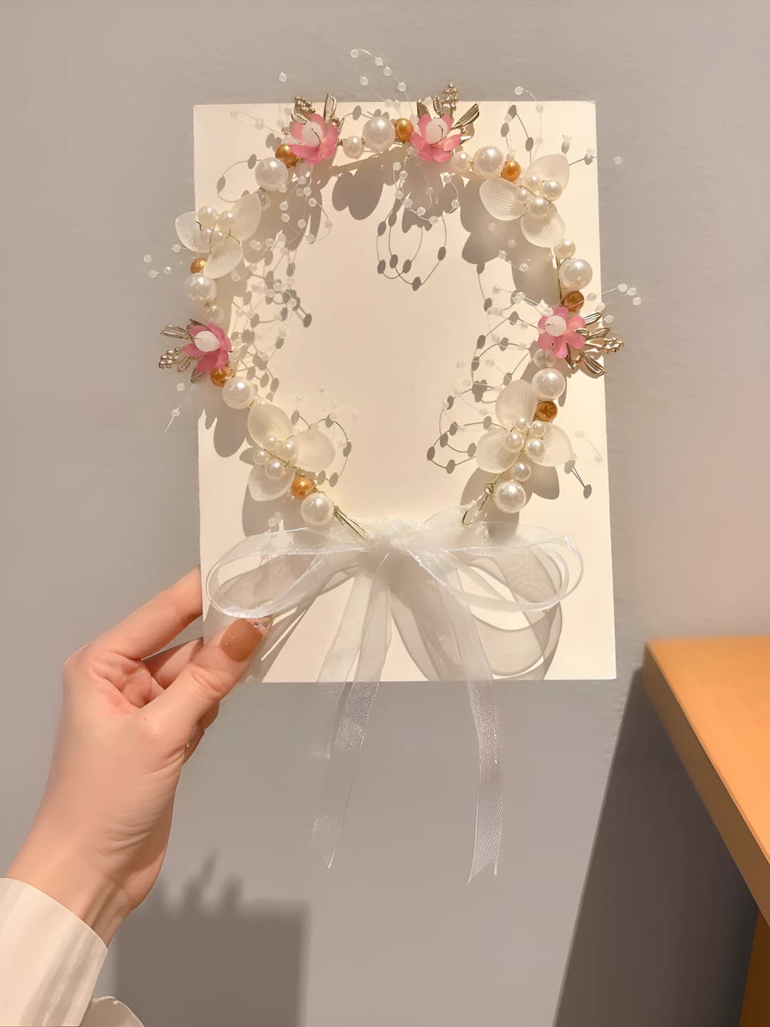 Gold pearl flowers and ribbons