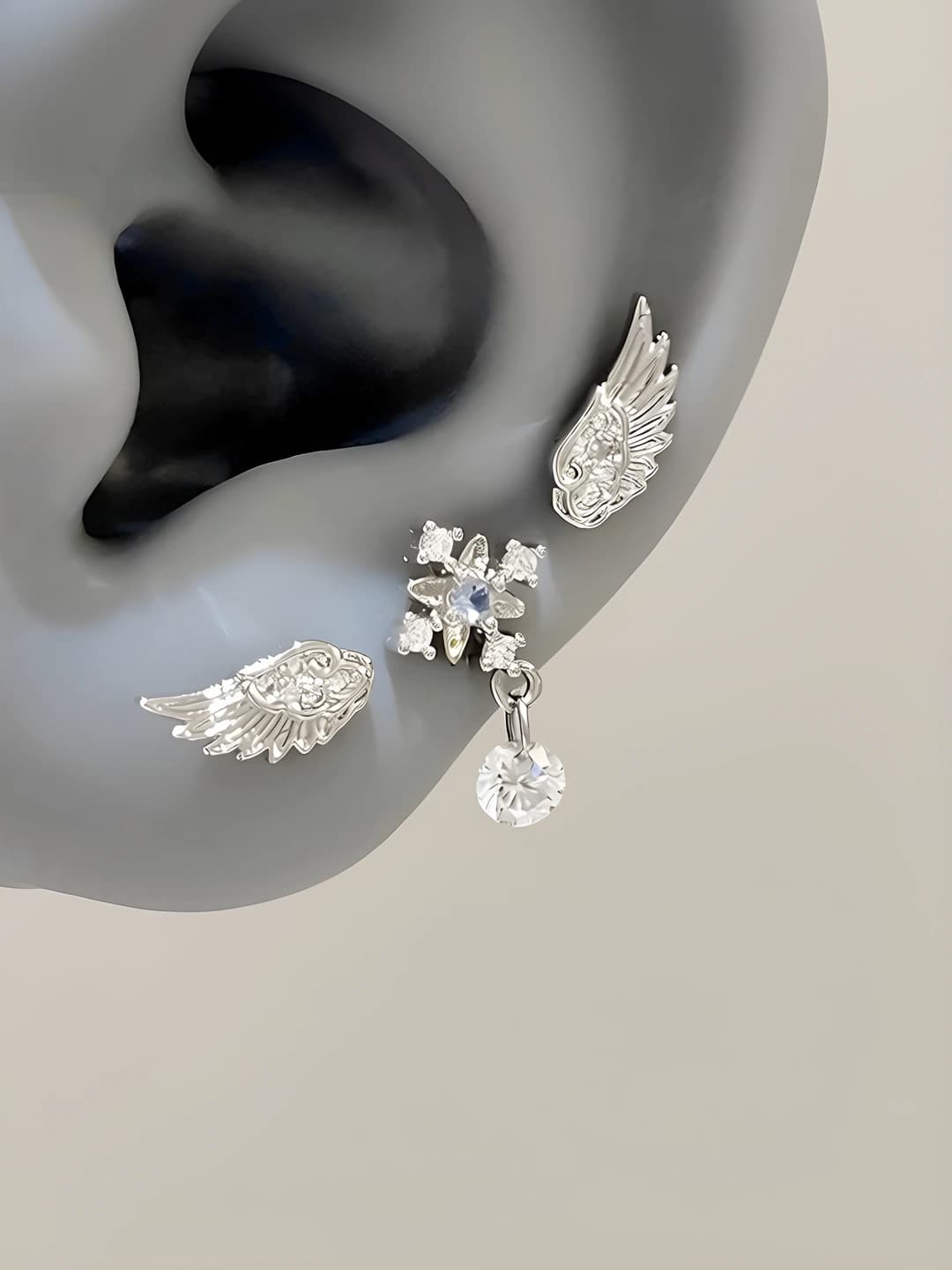 Women's wing-shaped stud earrings, titanium steel, zirconia set, cartoon character design, design element: wings, style: versatile