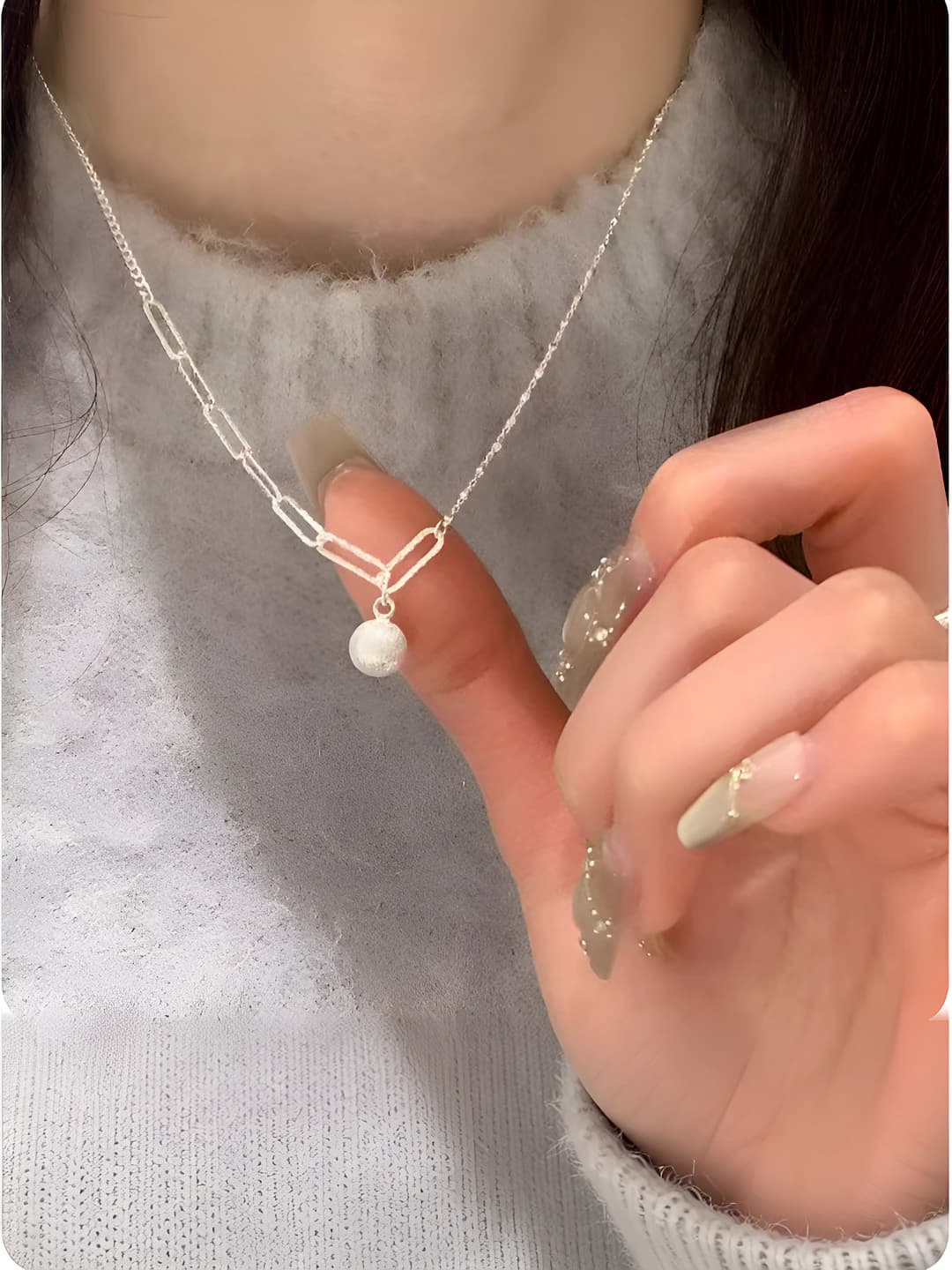 Women's long pendant necklace with matte sphere, geometric design, 2026