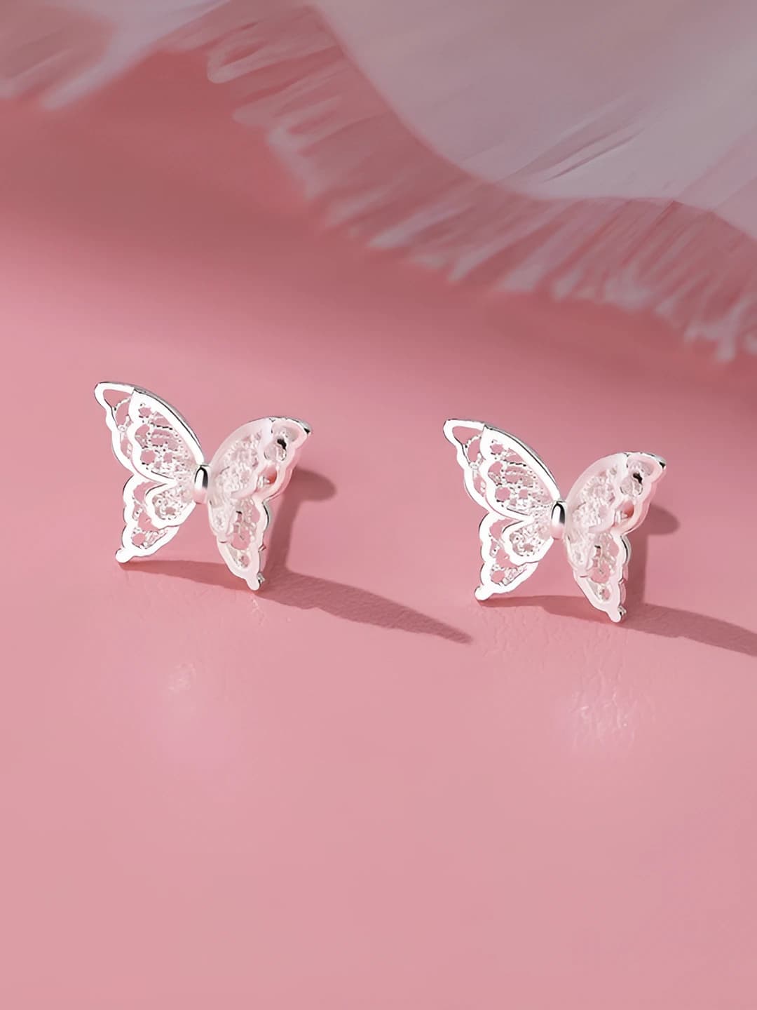 Silver filigree butterfly stud
