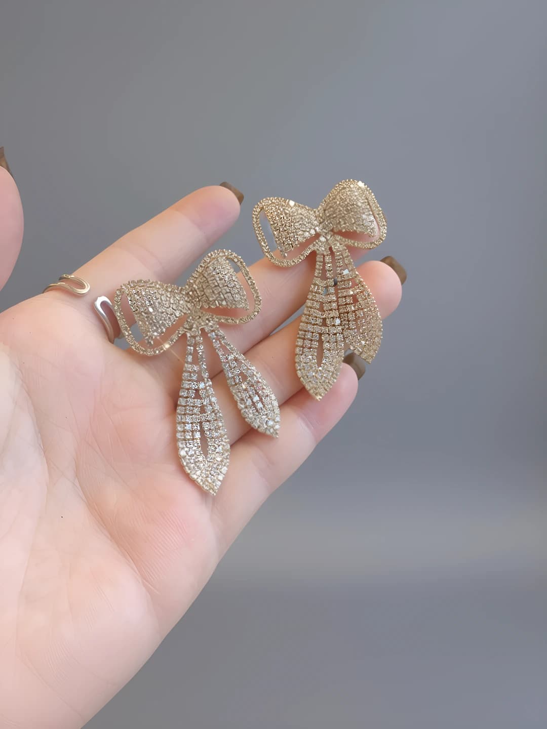 Women's long bow rhinestone dangle earrings in retro style