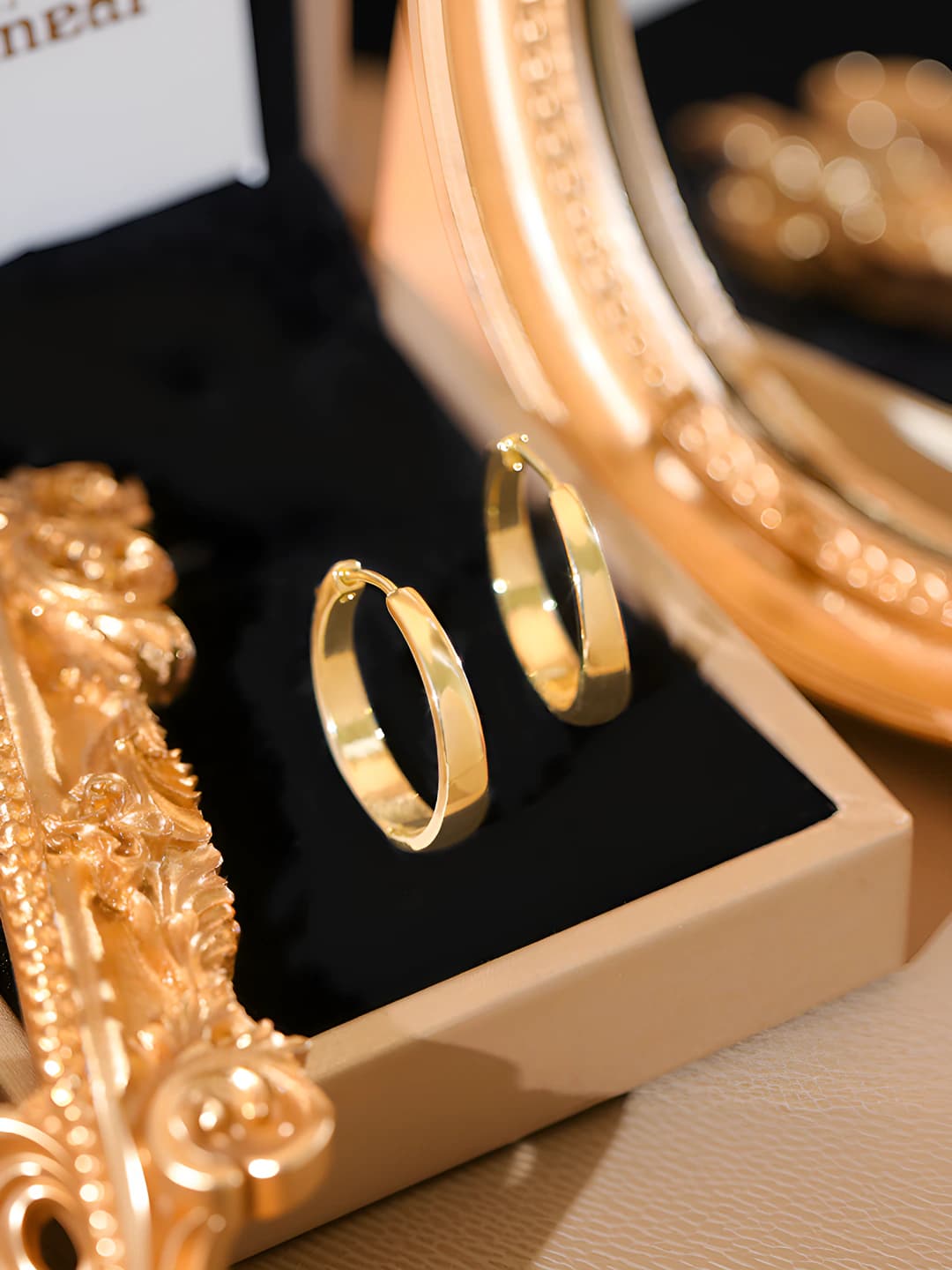 Women's geometric hoop earrings with gold plating