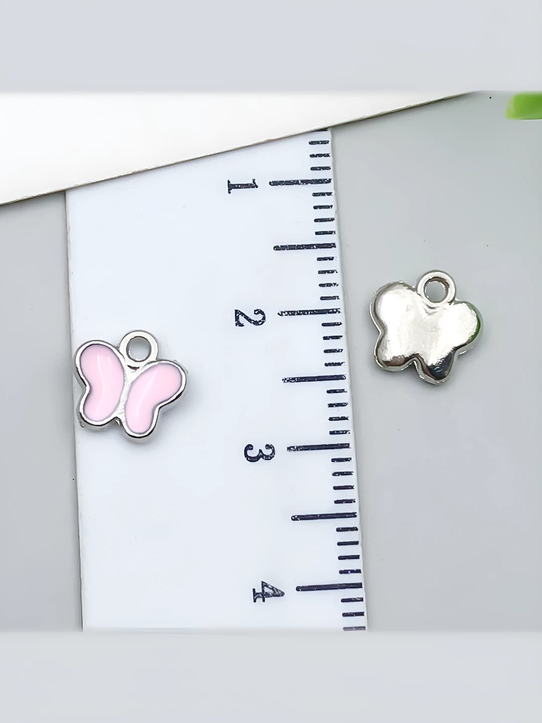 1 pc White K Pink Butterfly 8.5x8mm-0.3g-21891