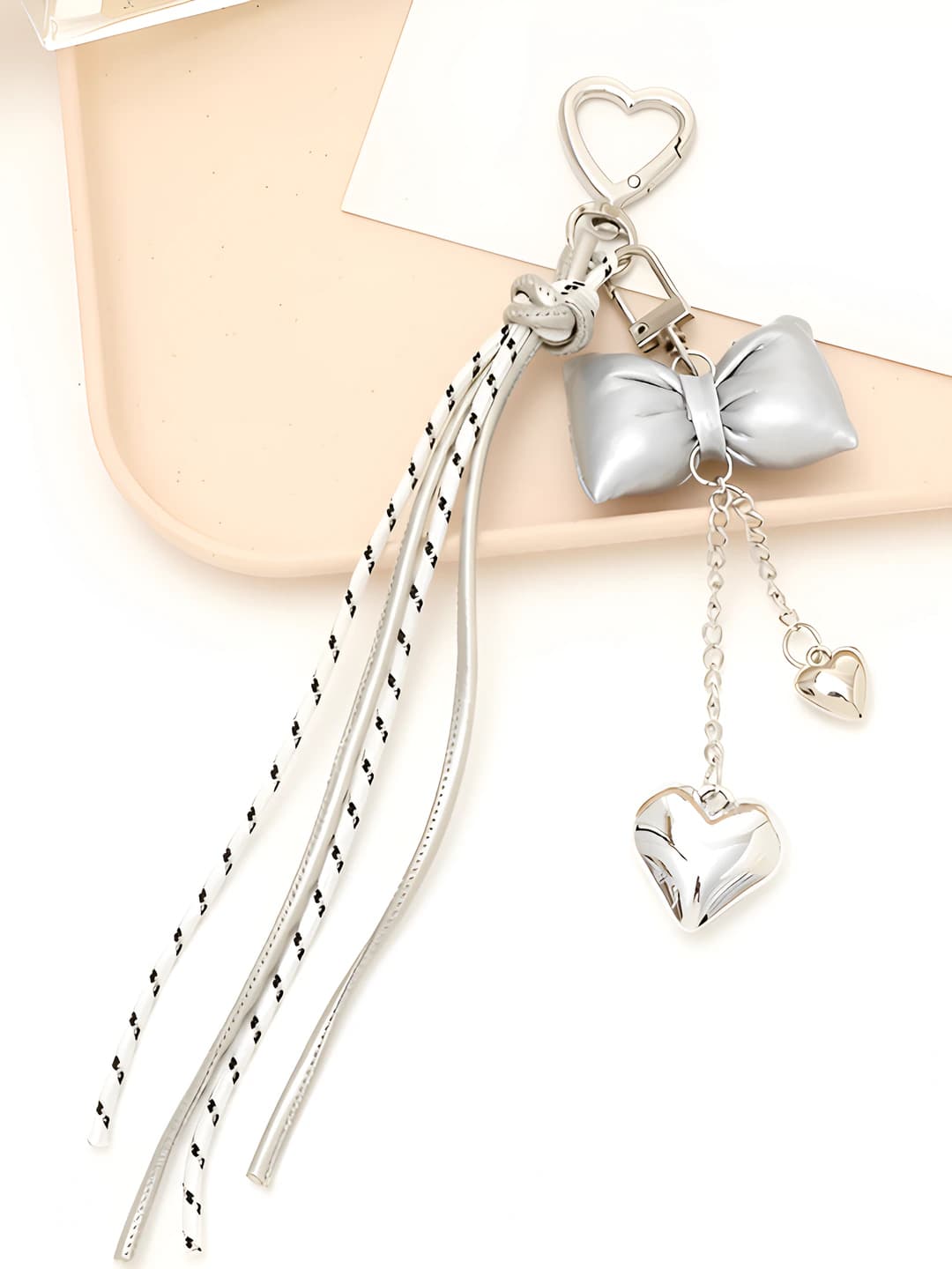 Leather and braided cord, silver bow