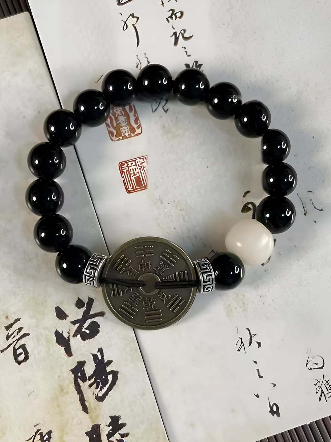 Black bead coin bracelet