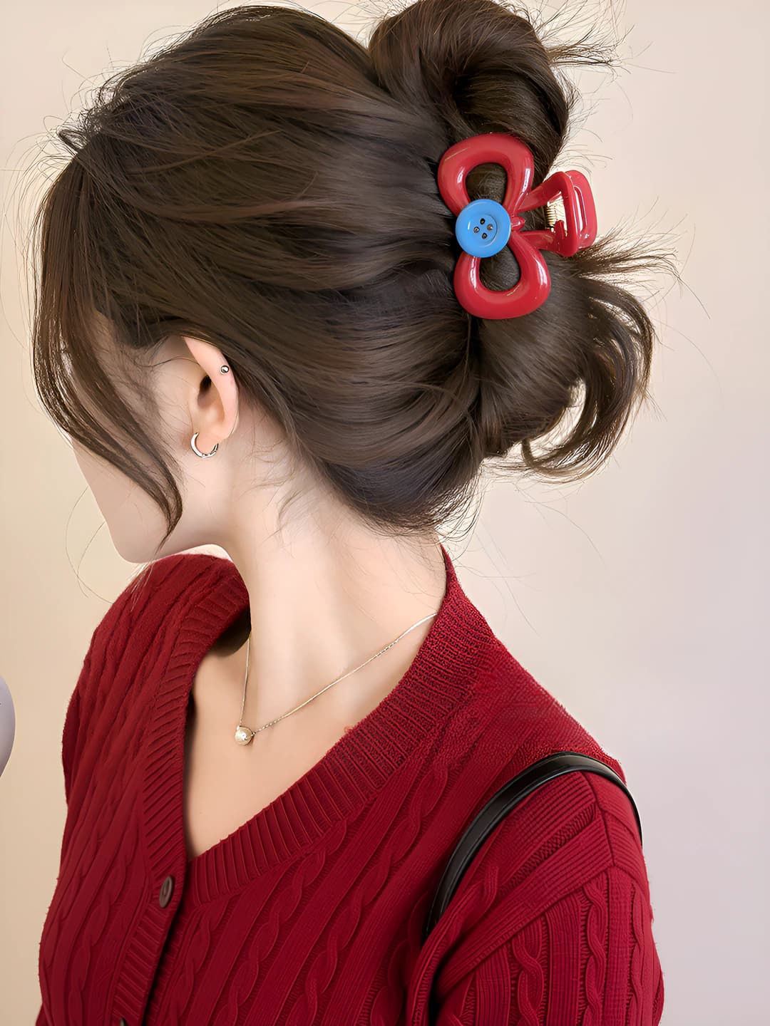 Red button claw clip