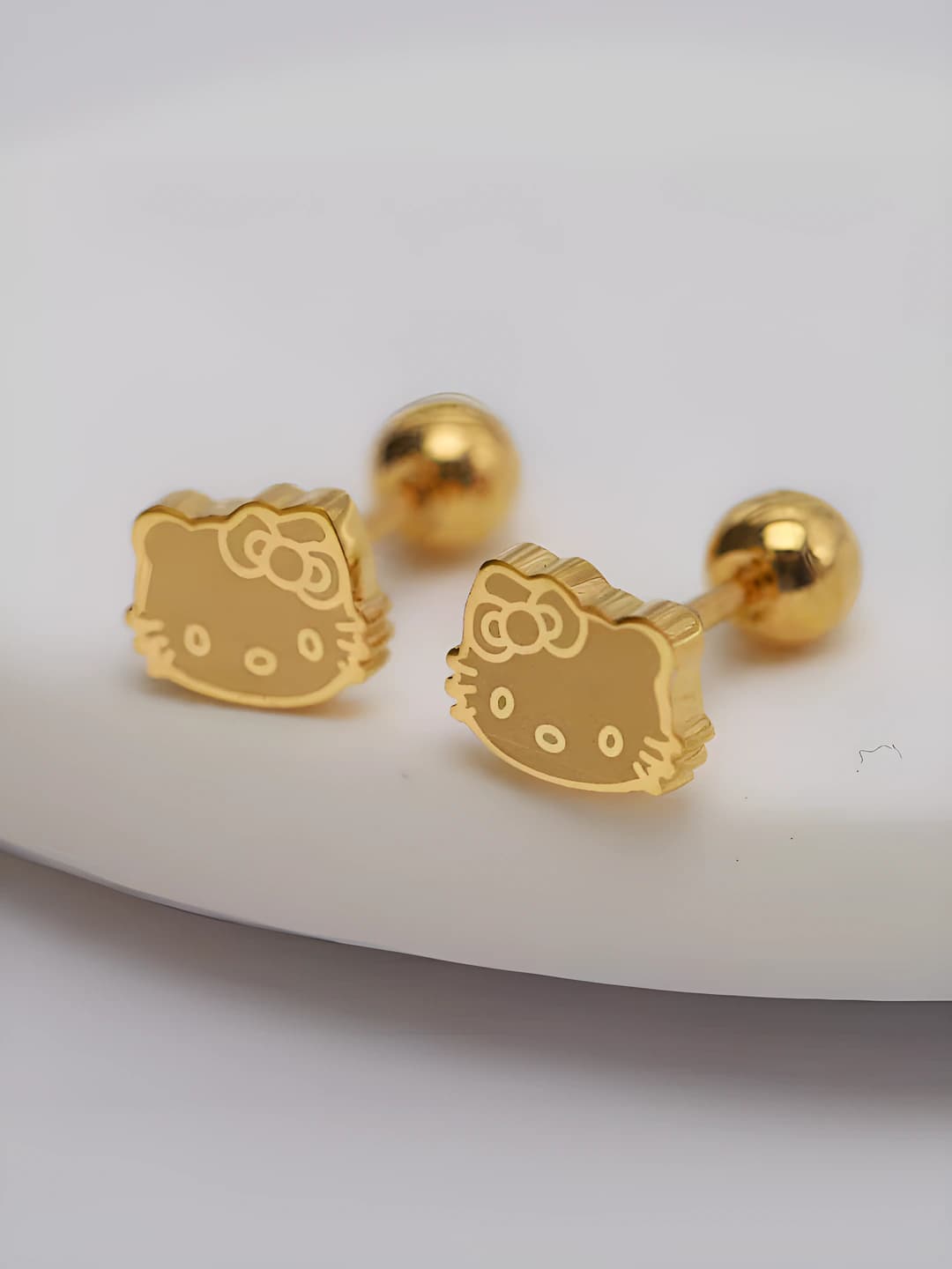 KT cat ear earrings, gold