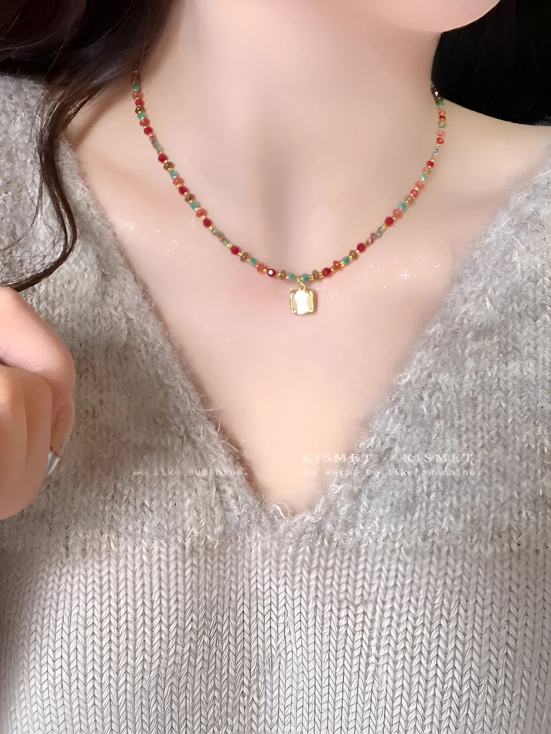 Women's beaded necklace with colorful crystal and cat's eye pendant in retro style