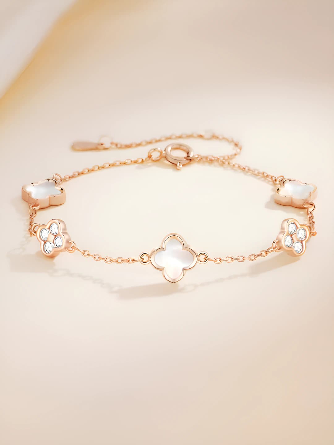Women's 2026 four-leaf clover bracelet in French light luxury style with shell inlay and floral design, holiday gift