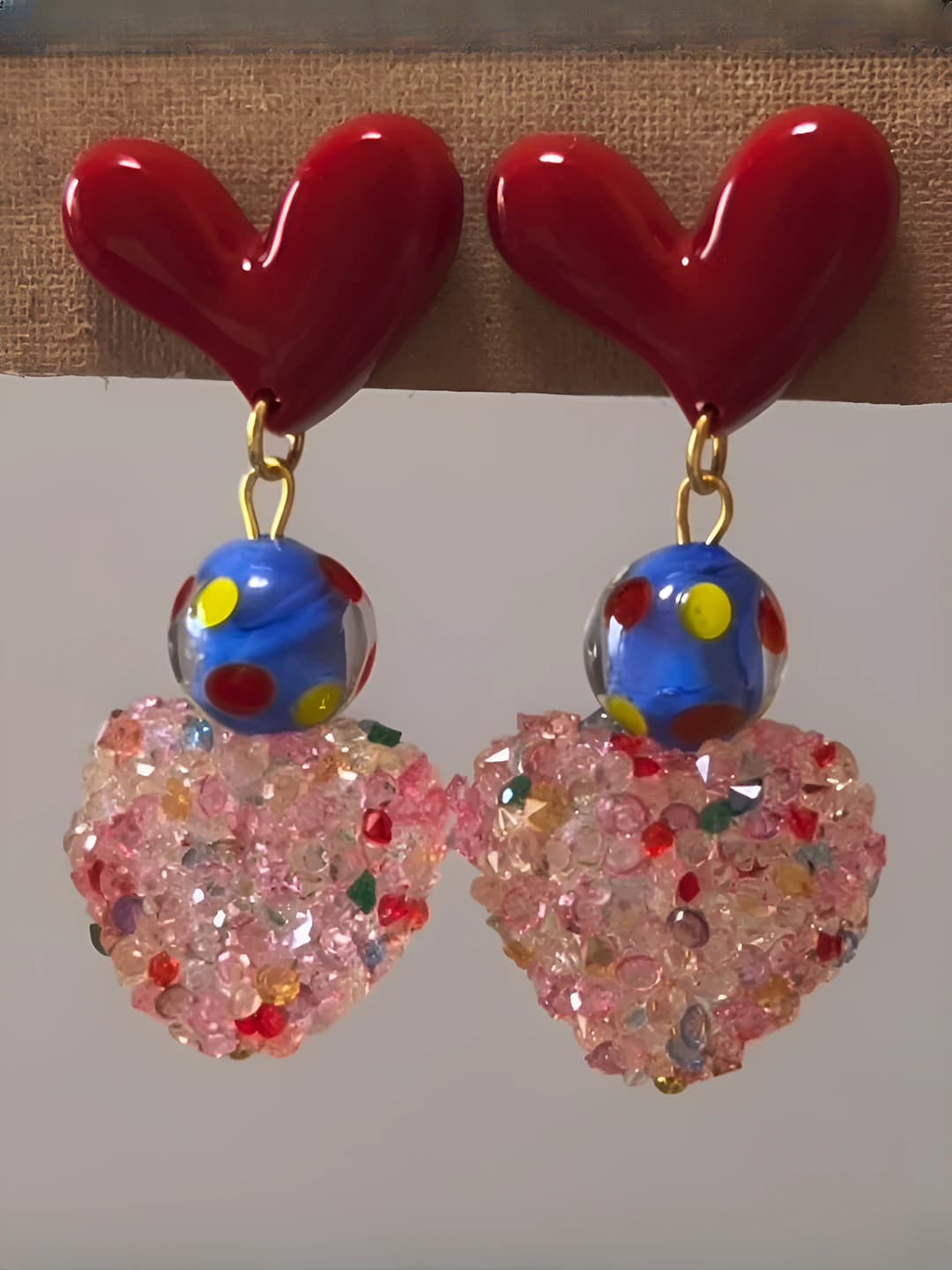 Women's colorful dopamine 3D heart-shaped earrings, with unique design element, made of glass, in a fashionable style