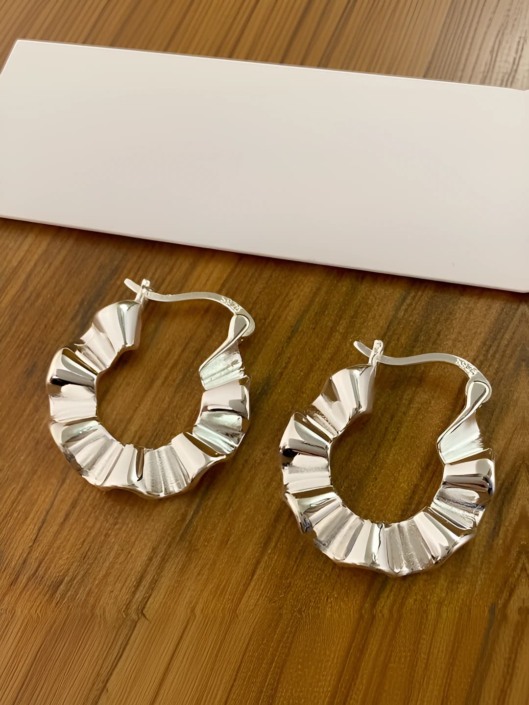 Women's Korean style copper earrings with wavy pleats and irregular design element