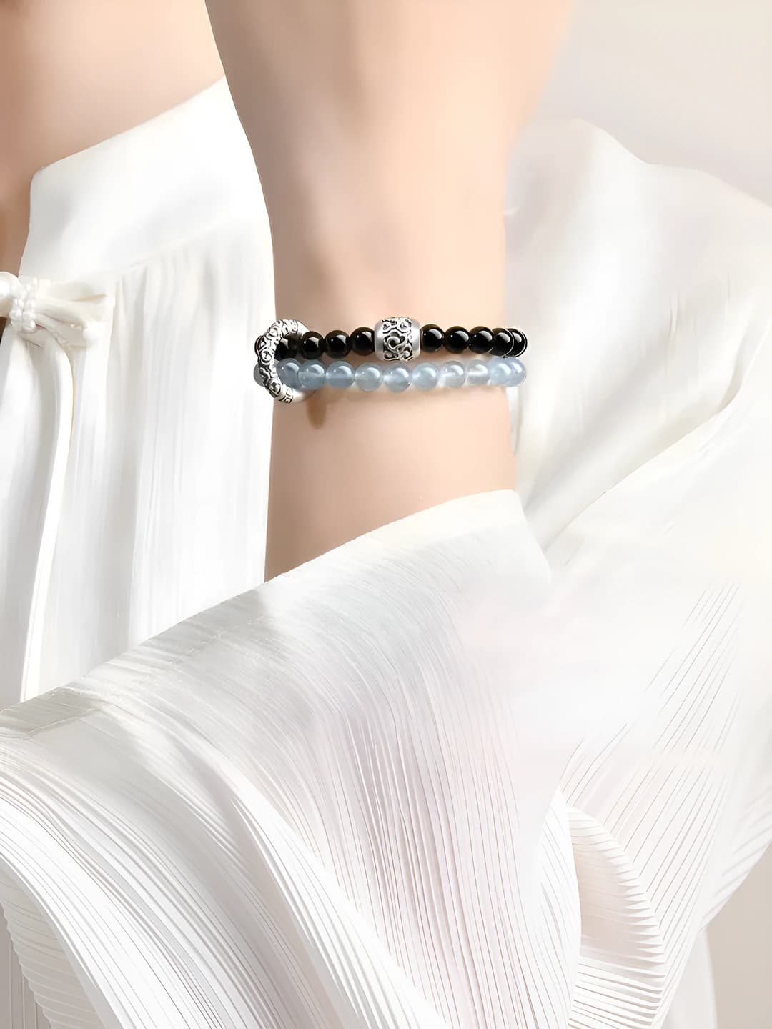Women's beaded bracelet: Putuoshan obsidian and blue chalcedony, 27 round beads, natural crystal, modern minimalist style