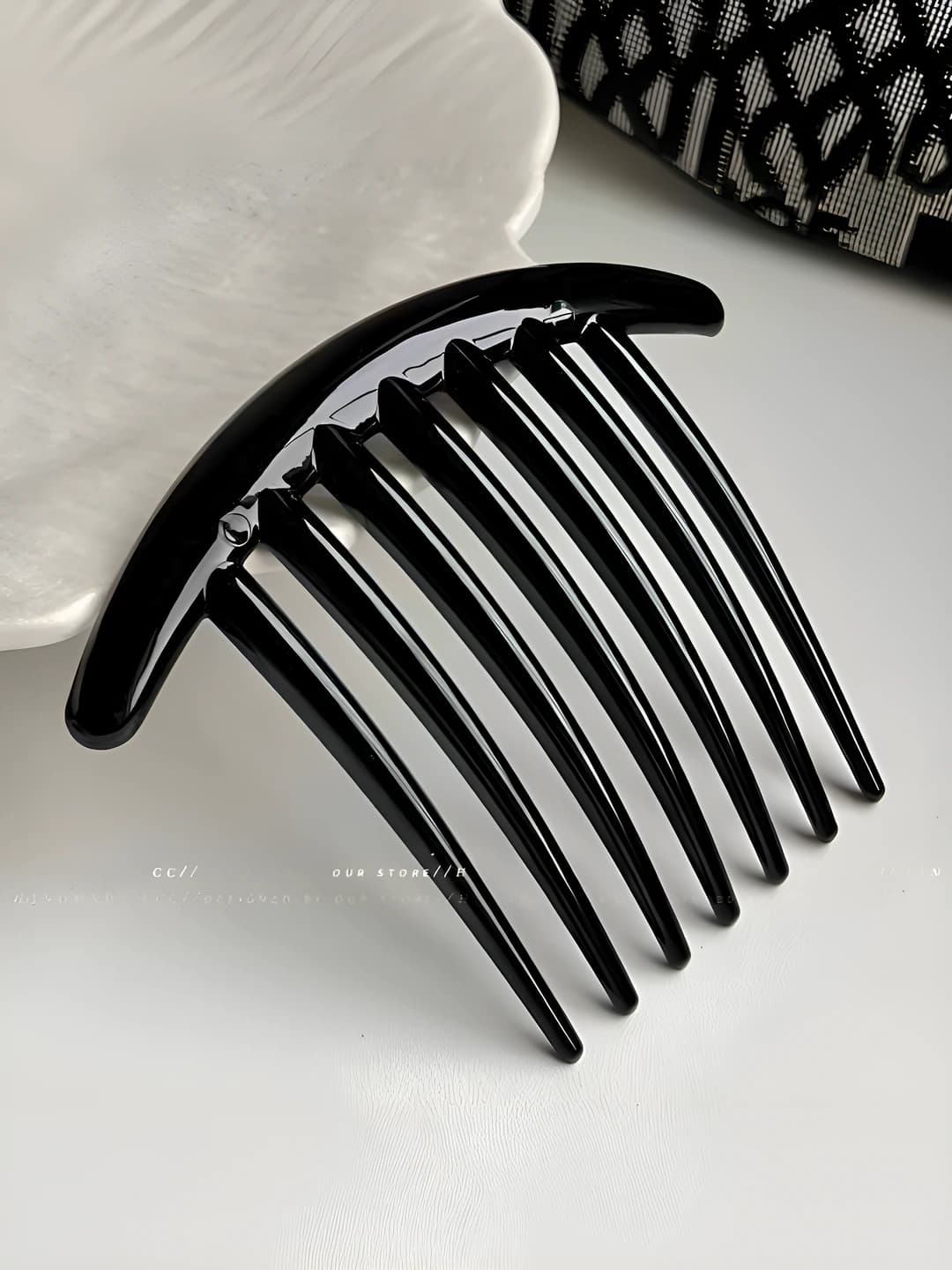 7-tooth comb - glossy black