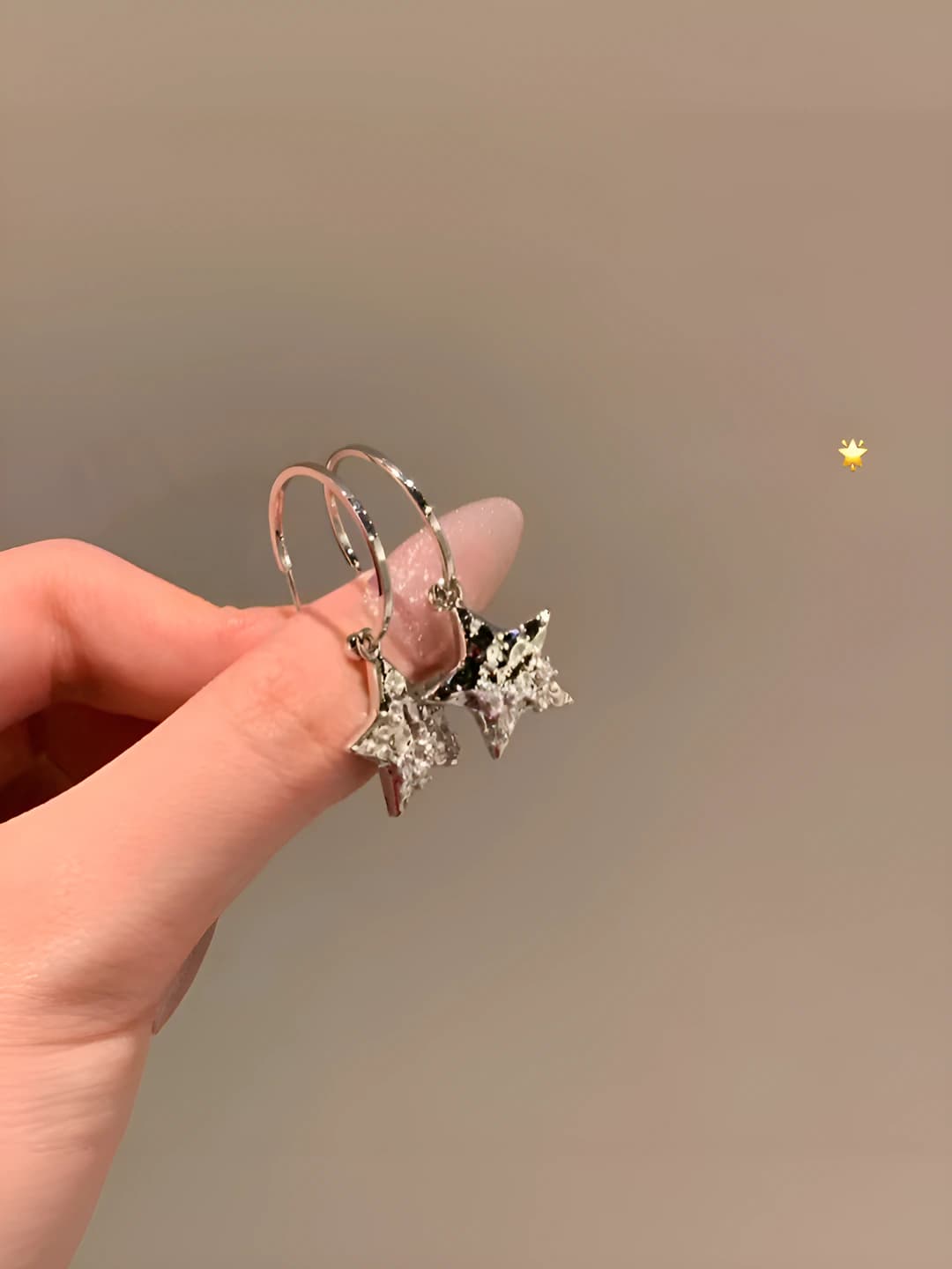 Silver five-pointed star hoop earrings