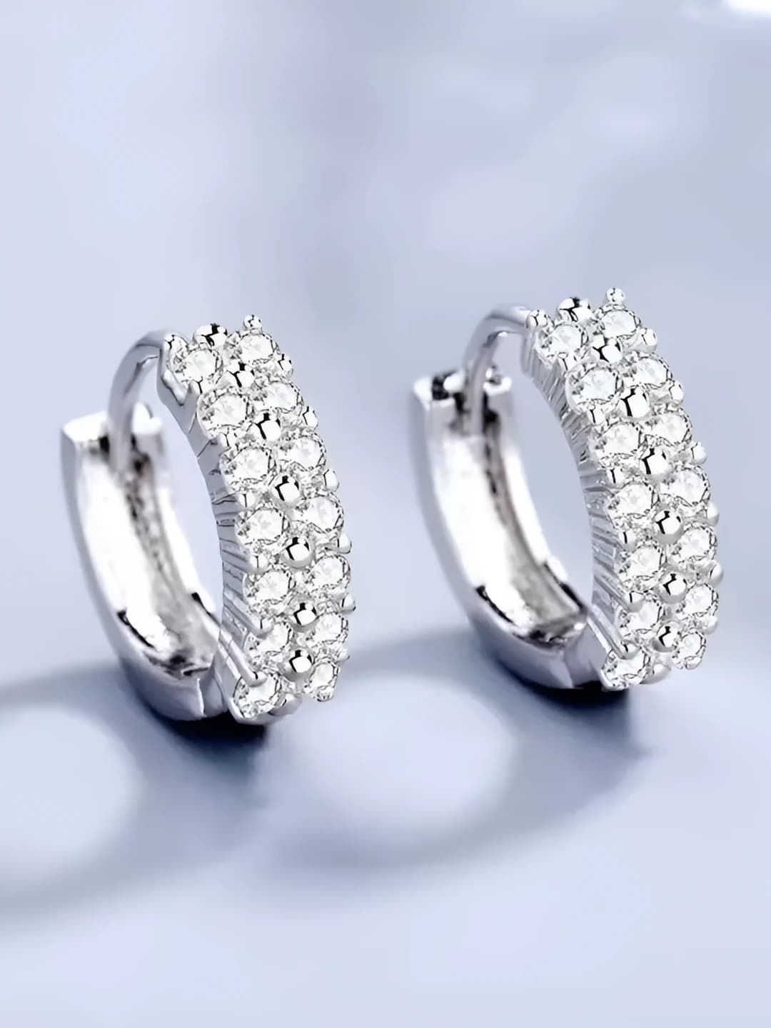 Women's geometric hoop earrings with double row rhinestones, metallic shine, teardrop shape