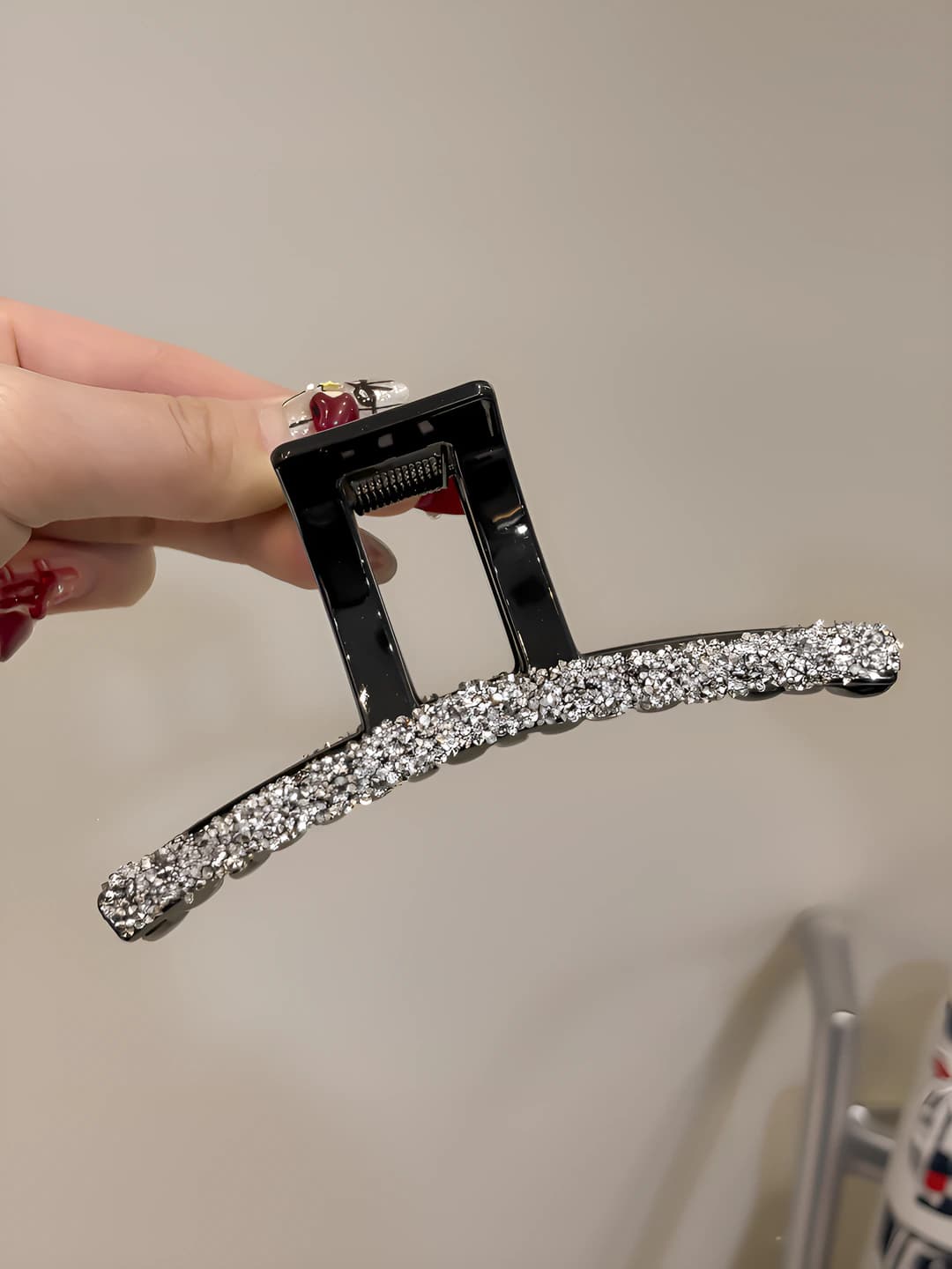 Silver, with small diamonds