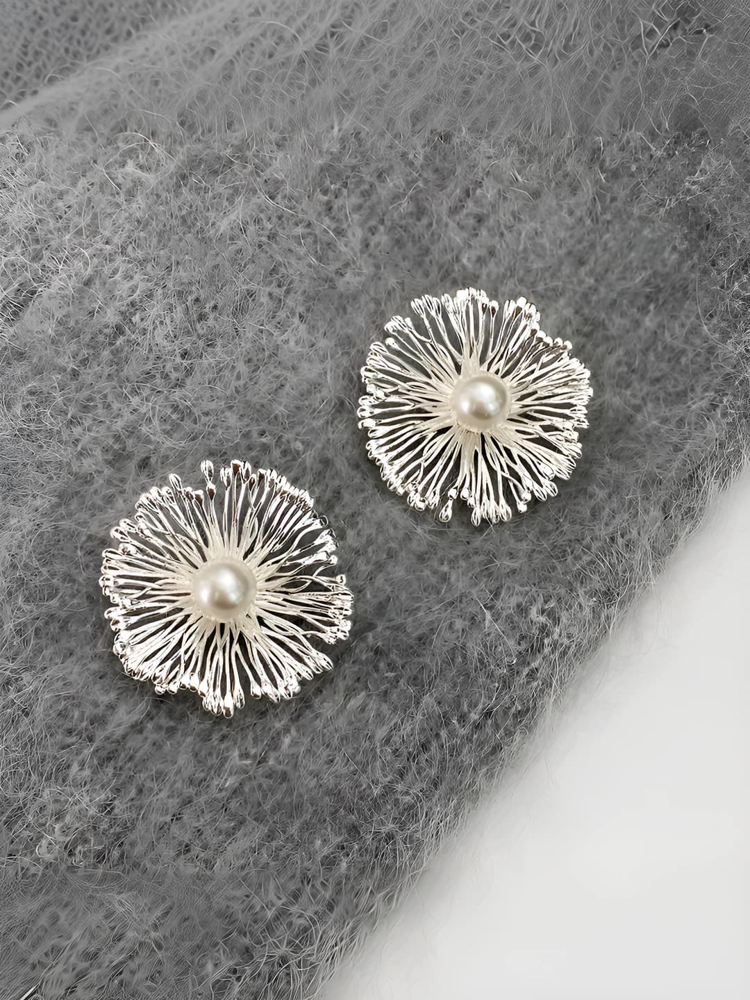 Women's retro style flower pattern earrings, Chanel style, large size, light luxury feel, cold style, sweet and fresh design, made of copper, with electroplating