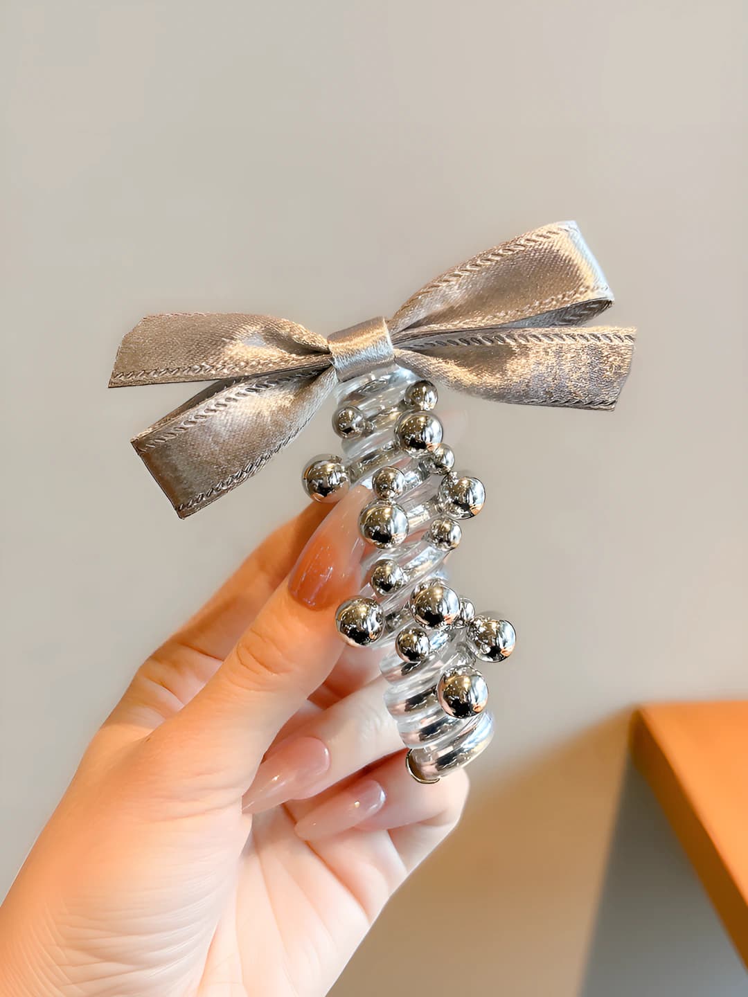 2# Small bow phone cord hair tie