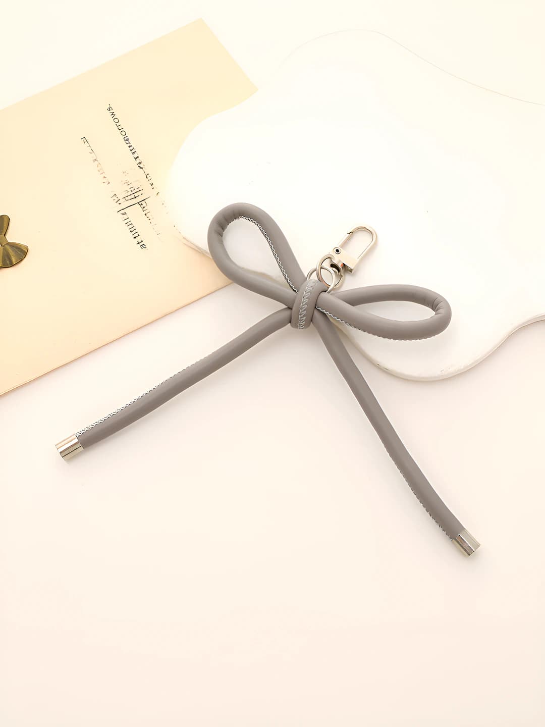 K3655 Leather bow charm Grey
