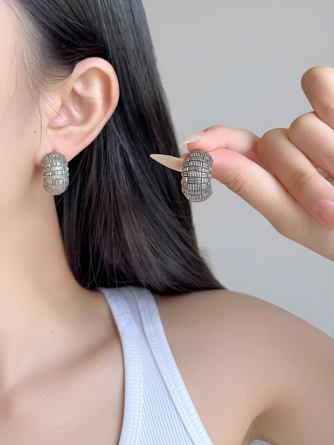 Women's silver braided pattern geometric hoop earrings