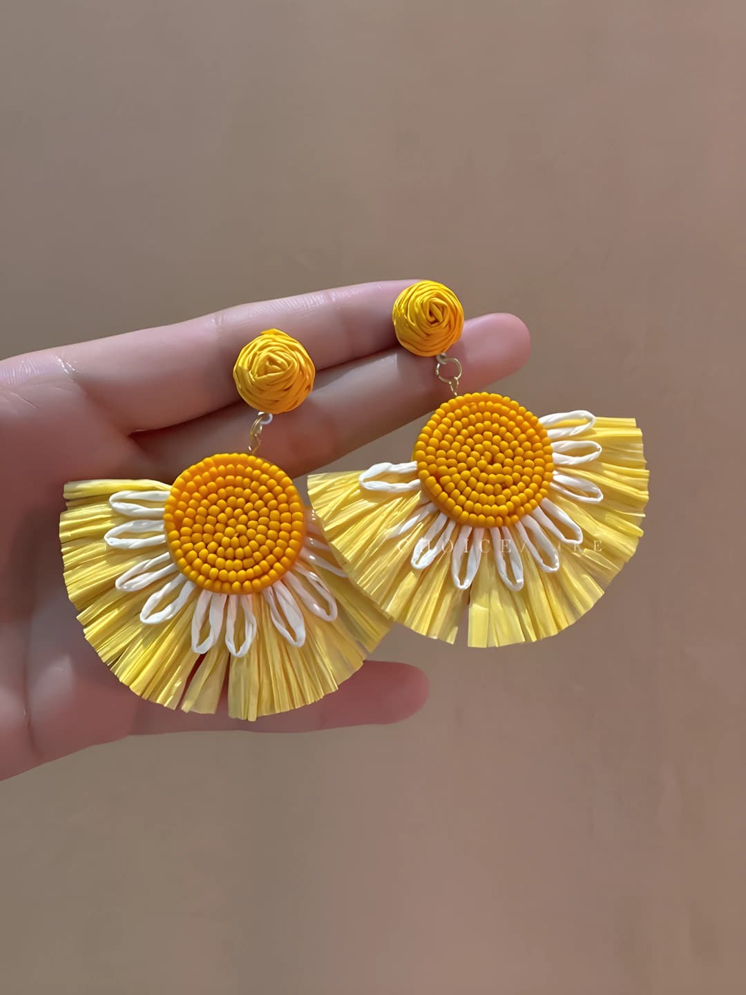 Yellow woven skirt stud earrings