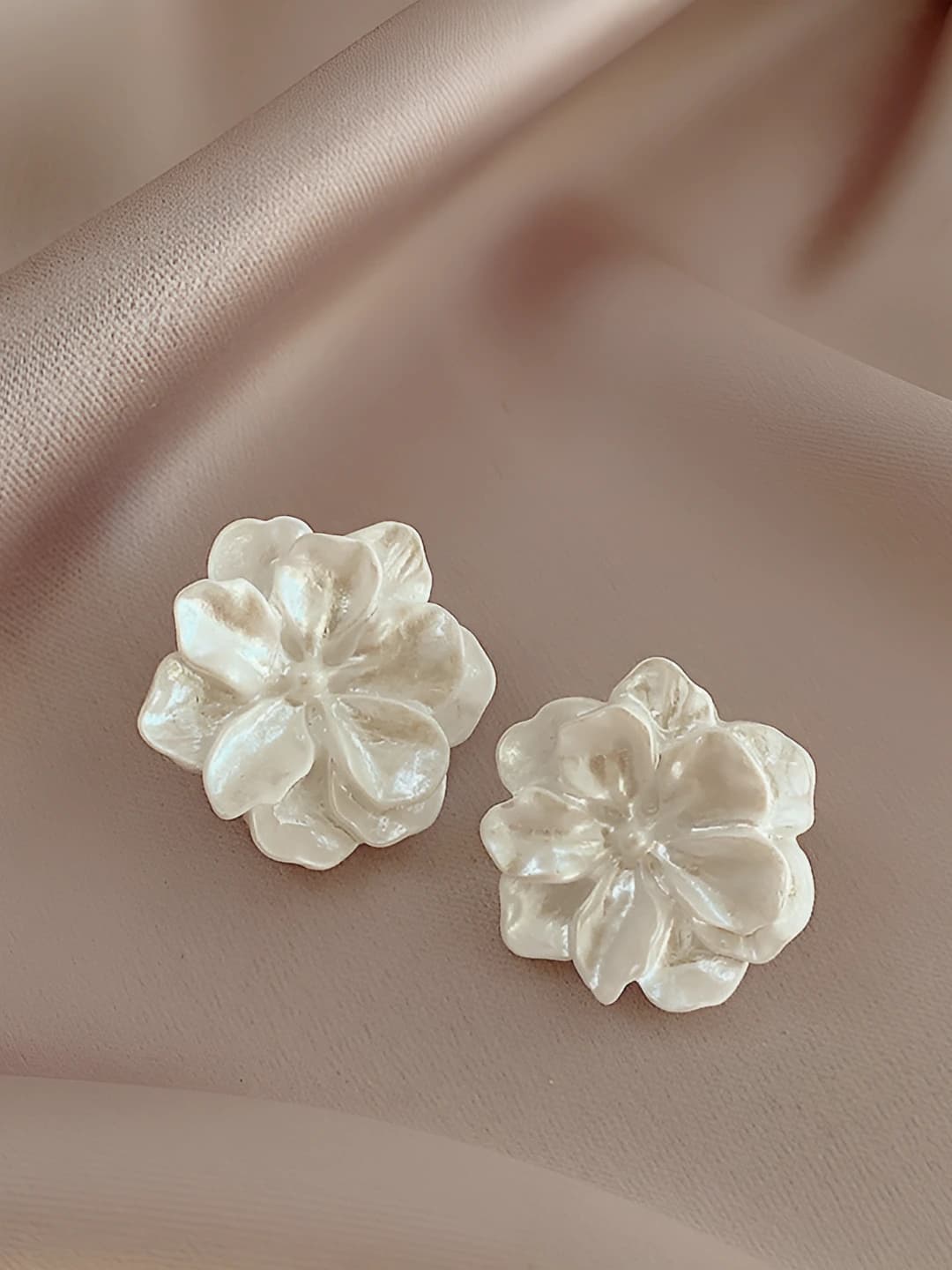 White floral stud earrings