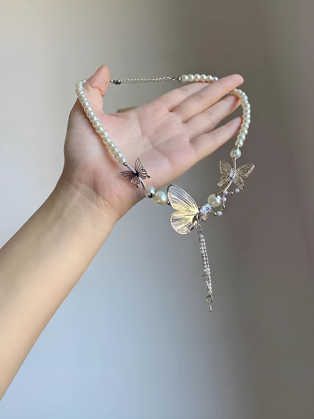 Cutout butterfly tassel necklace X5049
