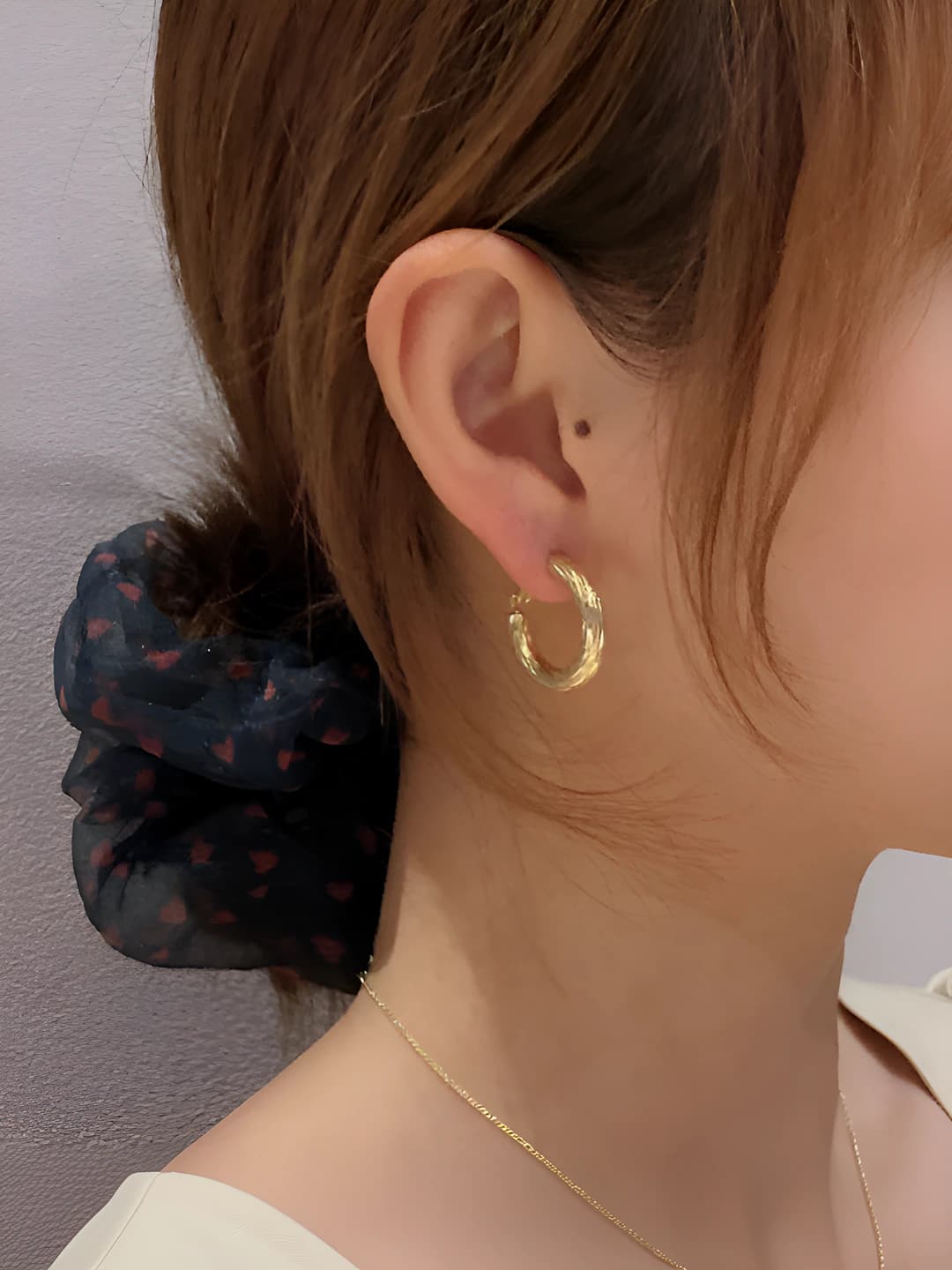 Women's silver post hoop earrings, sports style, geometric design element