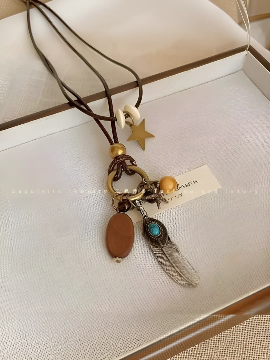 Bronze feather necklace