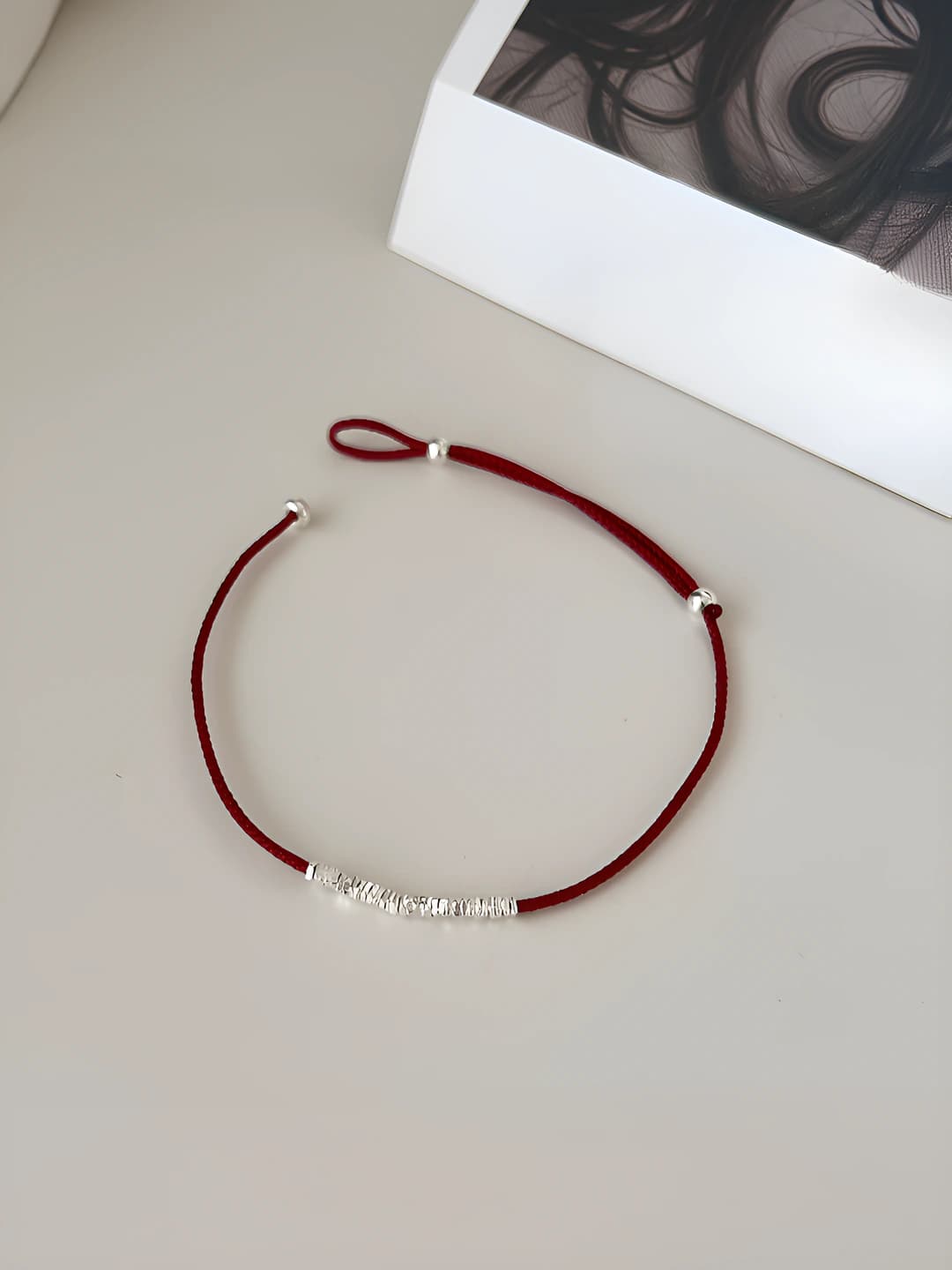 Red hand string