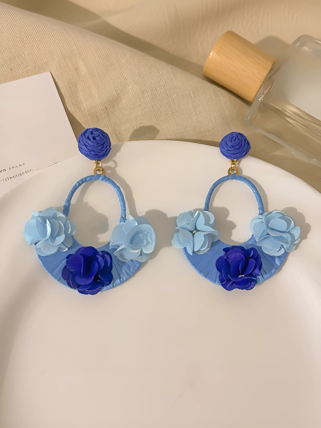 Blue floral basket stud earrings