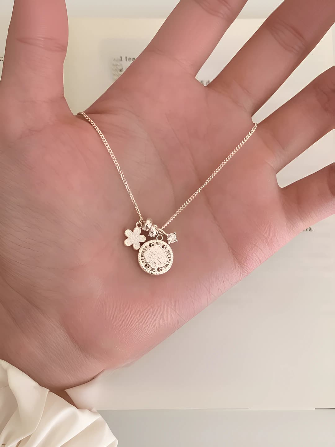 Floral compass necklace