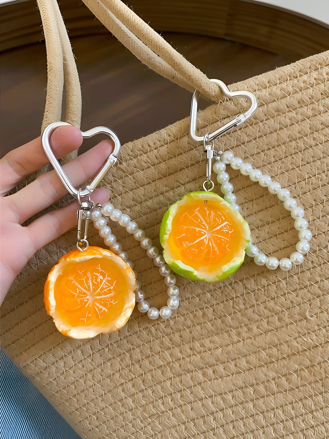 Women's pearl phone chain keychain with orange fruit pendant, Korean style, light luxury, simple and designer