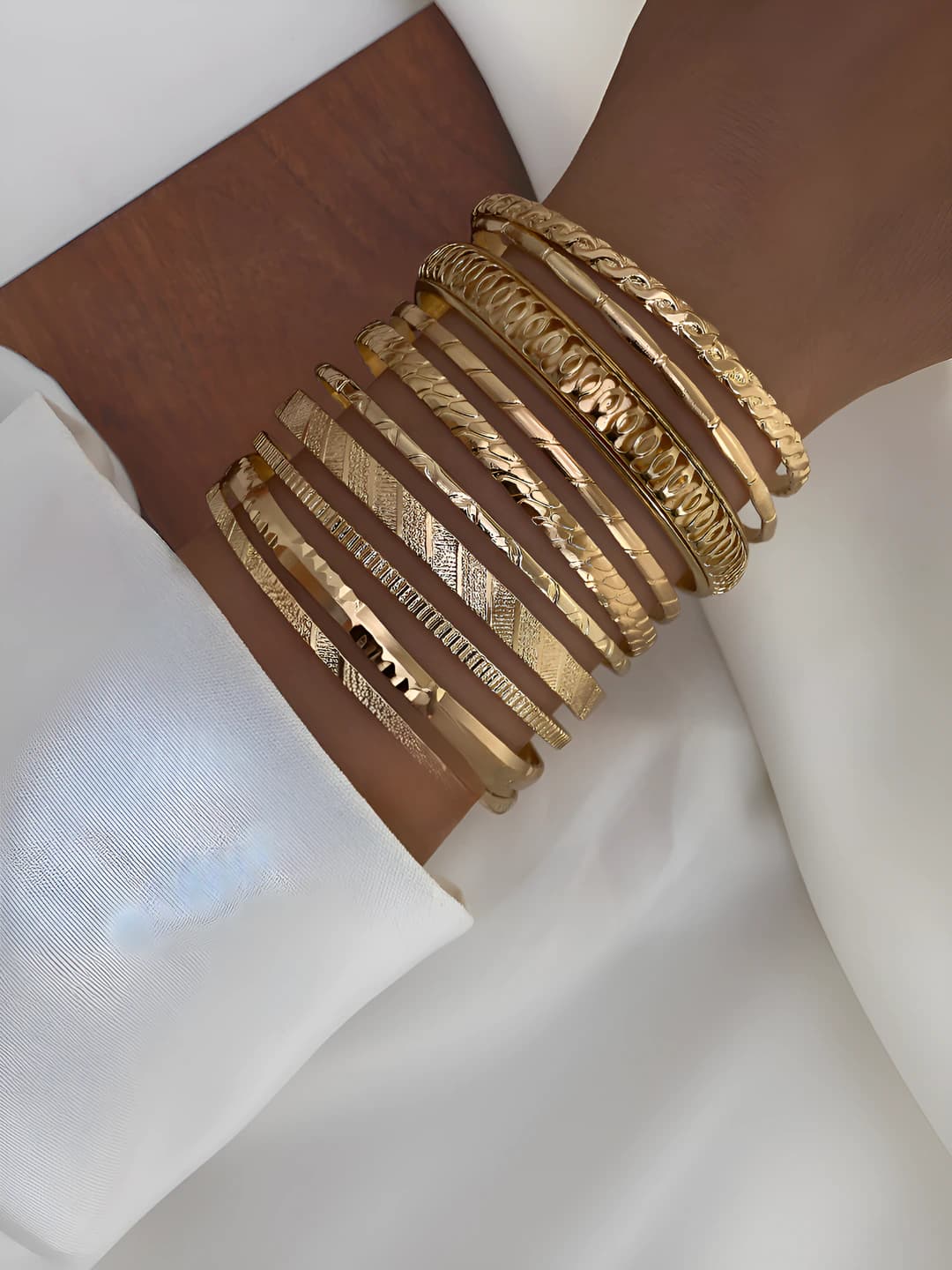 Women's set of 10 geometric cable knit stackable bangle bracelets