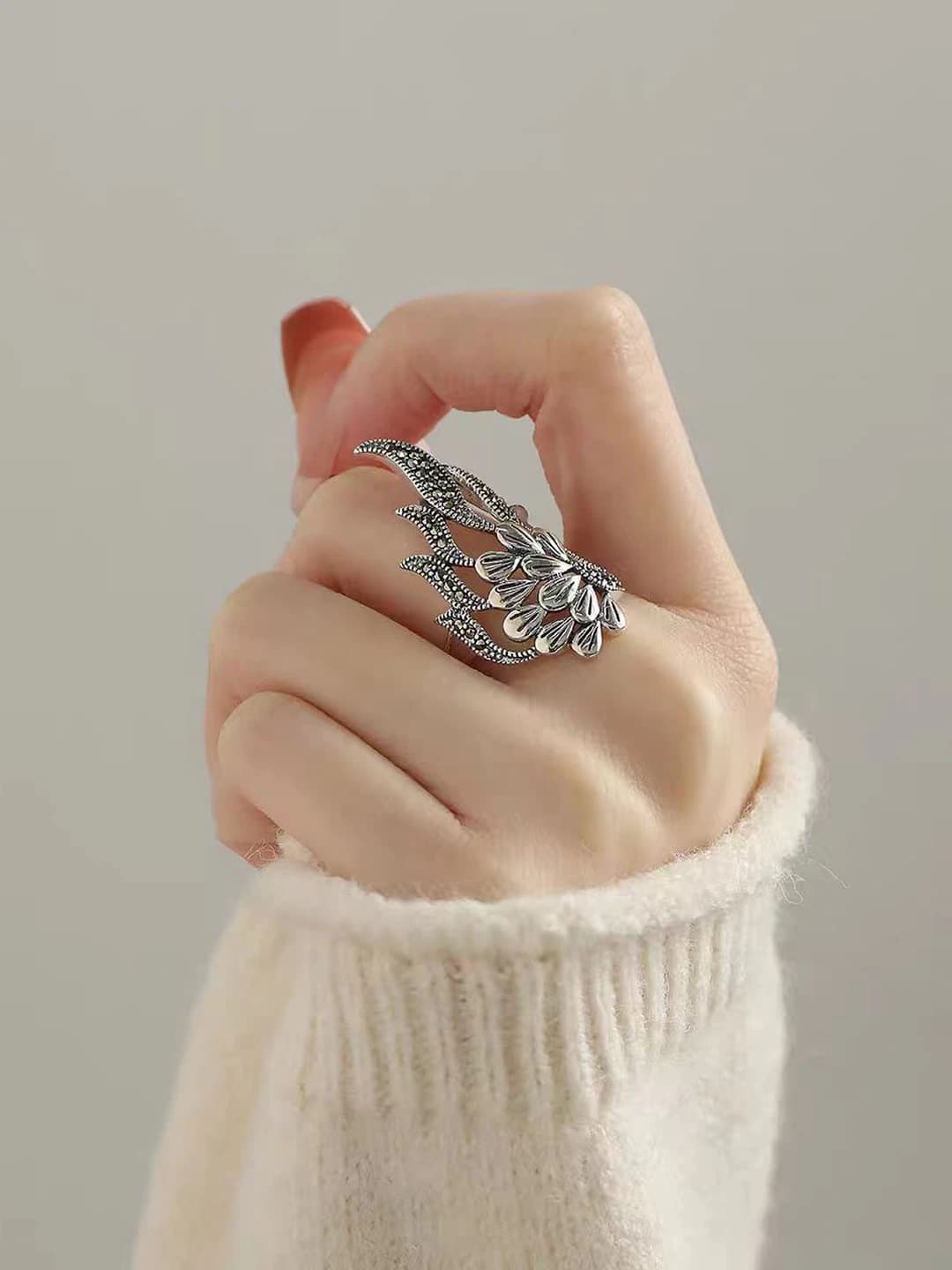 Distressed peacock ring